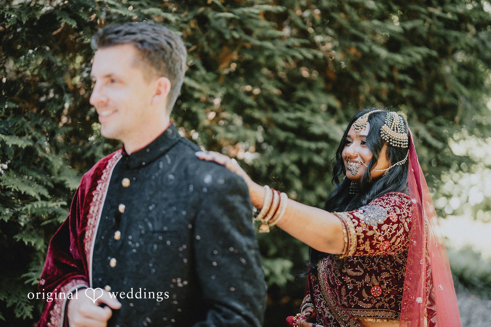 Bride gently approaching the groom