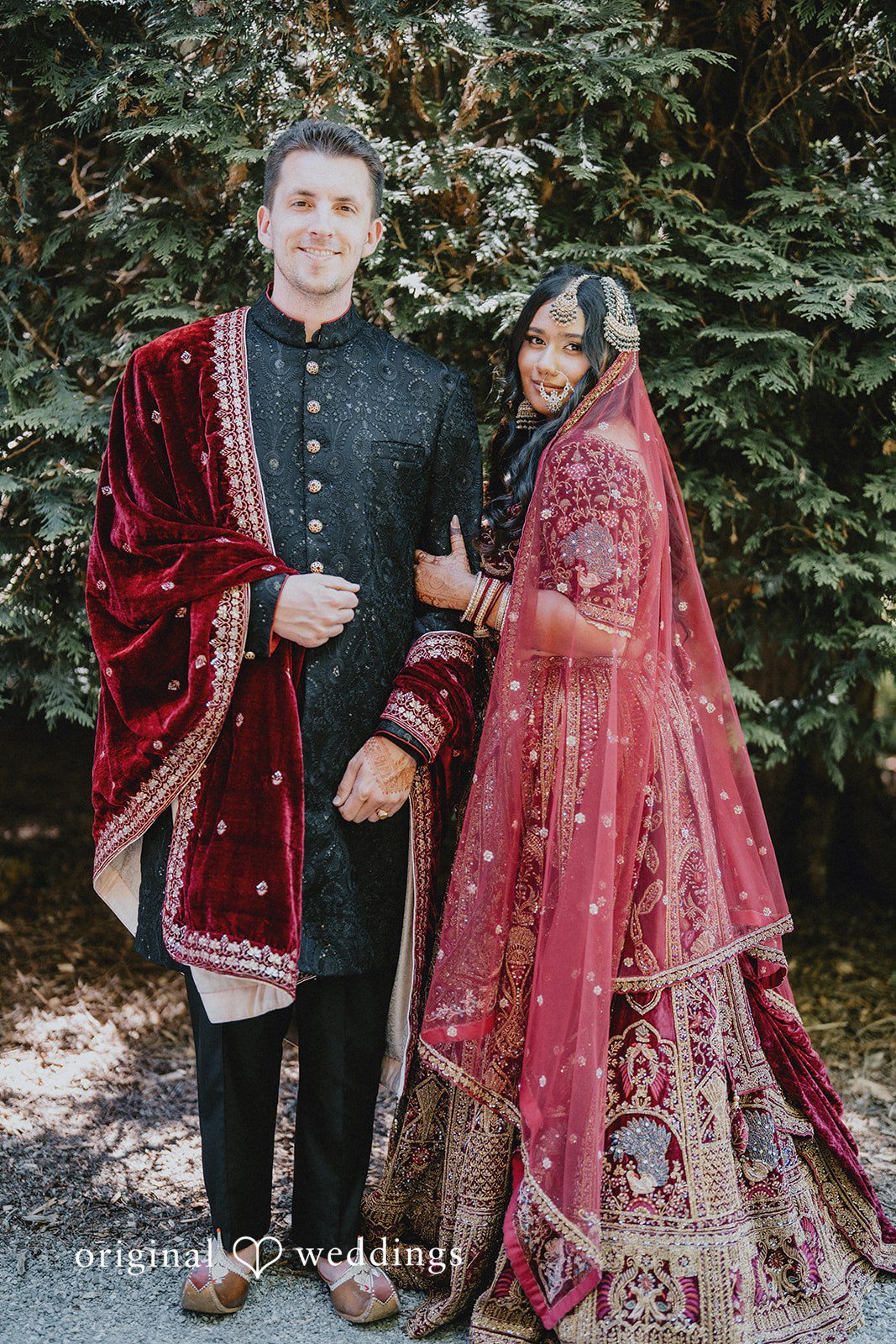 Romantic outdoor portrait of the newlyweds