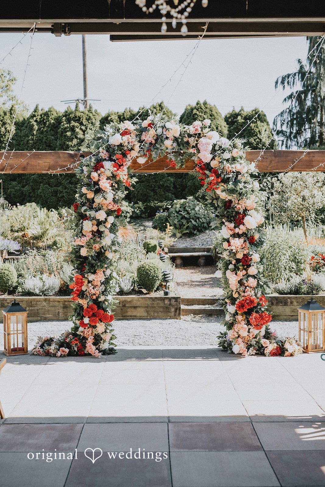 Elegant wedding ceremony venue decorated with floral arrangements at Willows Lodge