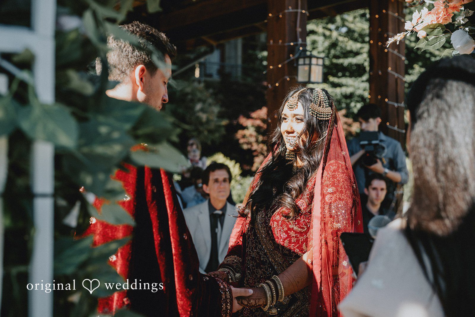 Bride and groom standing together during the wedding ceremony.