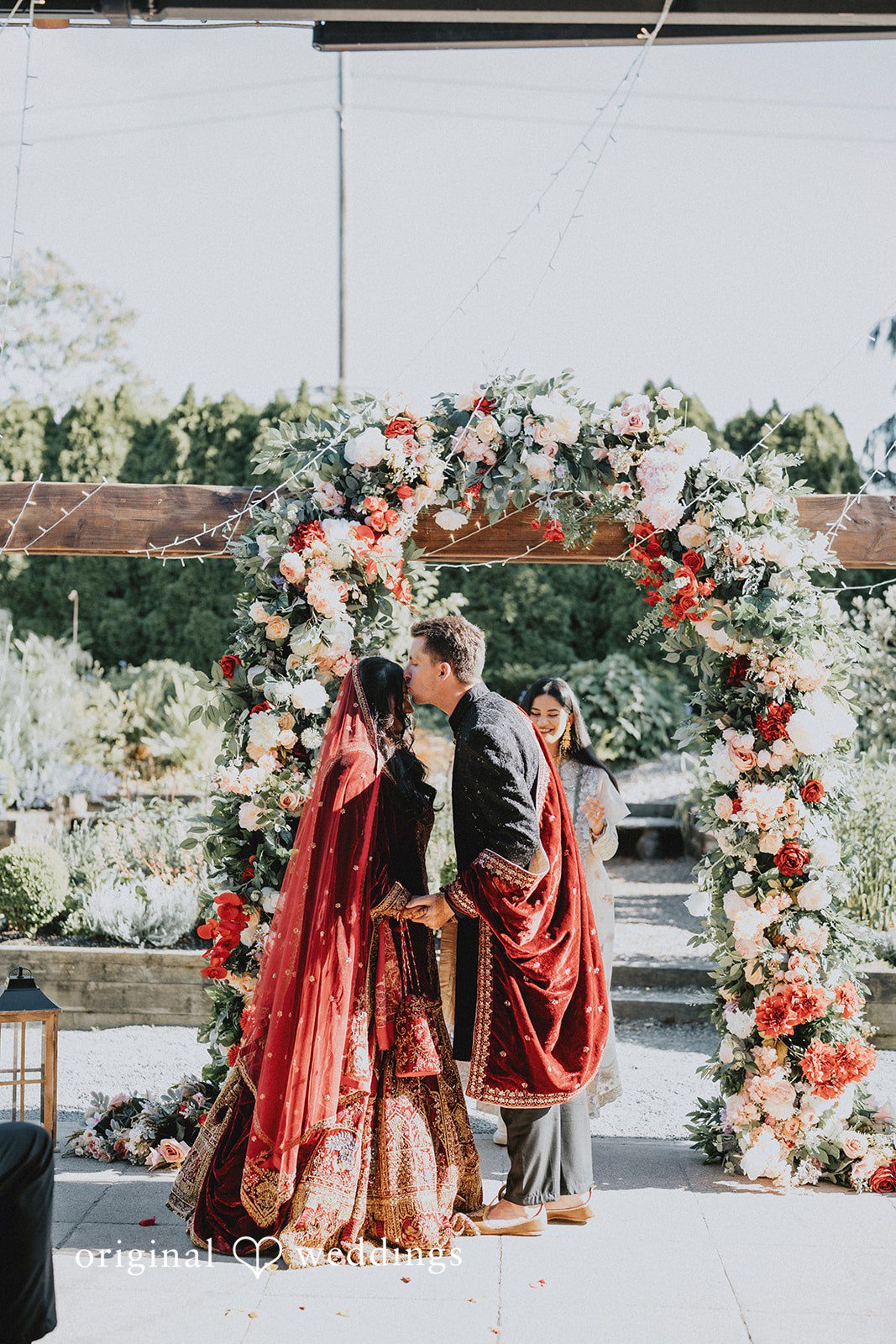 Romantic  first kiss at at Willows Lodge captured by Seattle Wedding Photographers from Original Weddings.