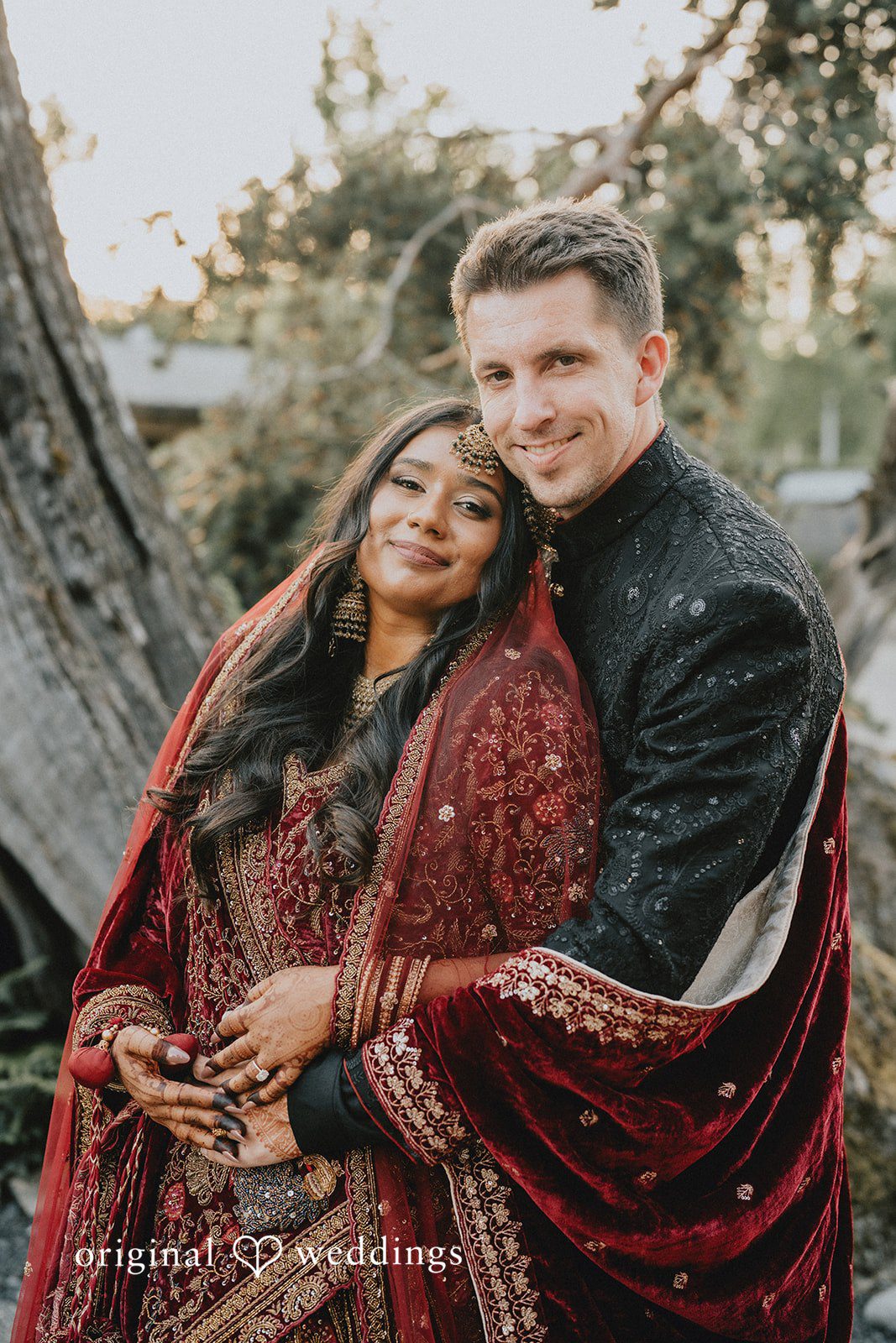 Bride and groom sharing a romantic pose together.