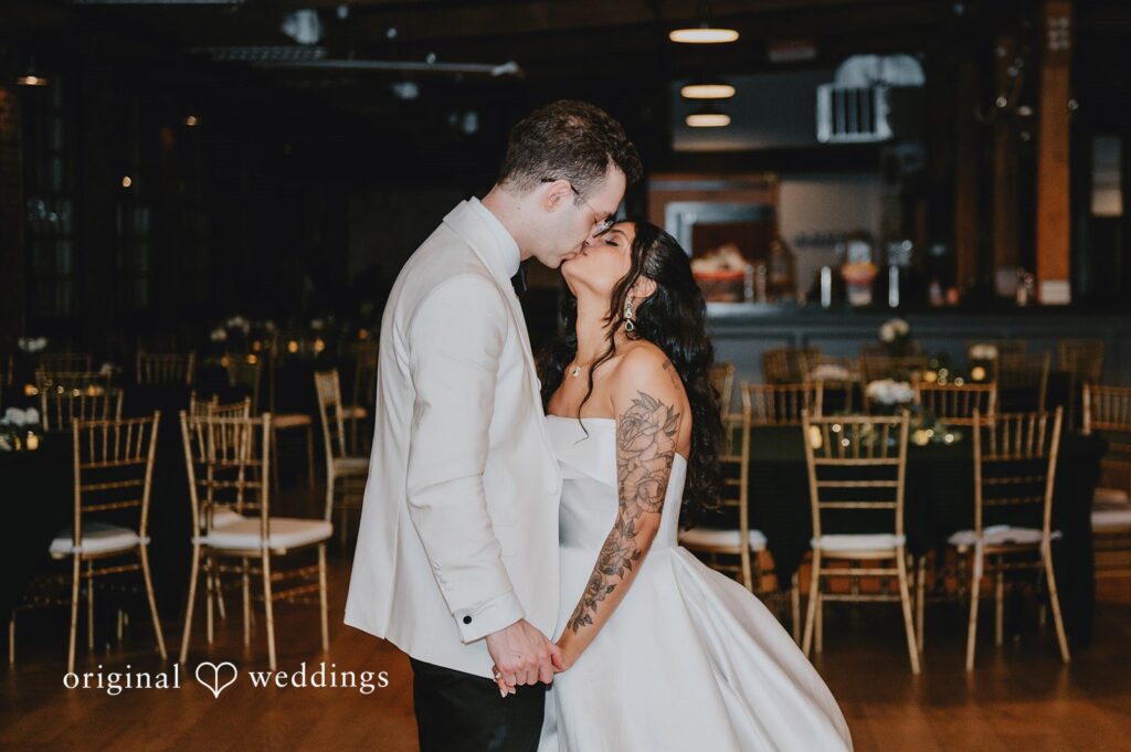 DC Wedding Photographers at Woolen Mill | Nikita & Quentin 2 Our DC wedding photographers at Original Weddings captured the moment the couple shared a romantic kiss at the Woolen Mill