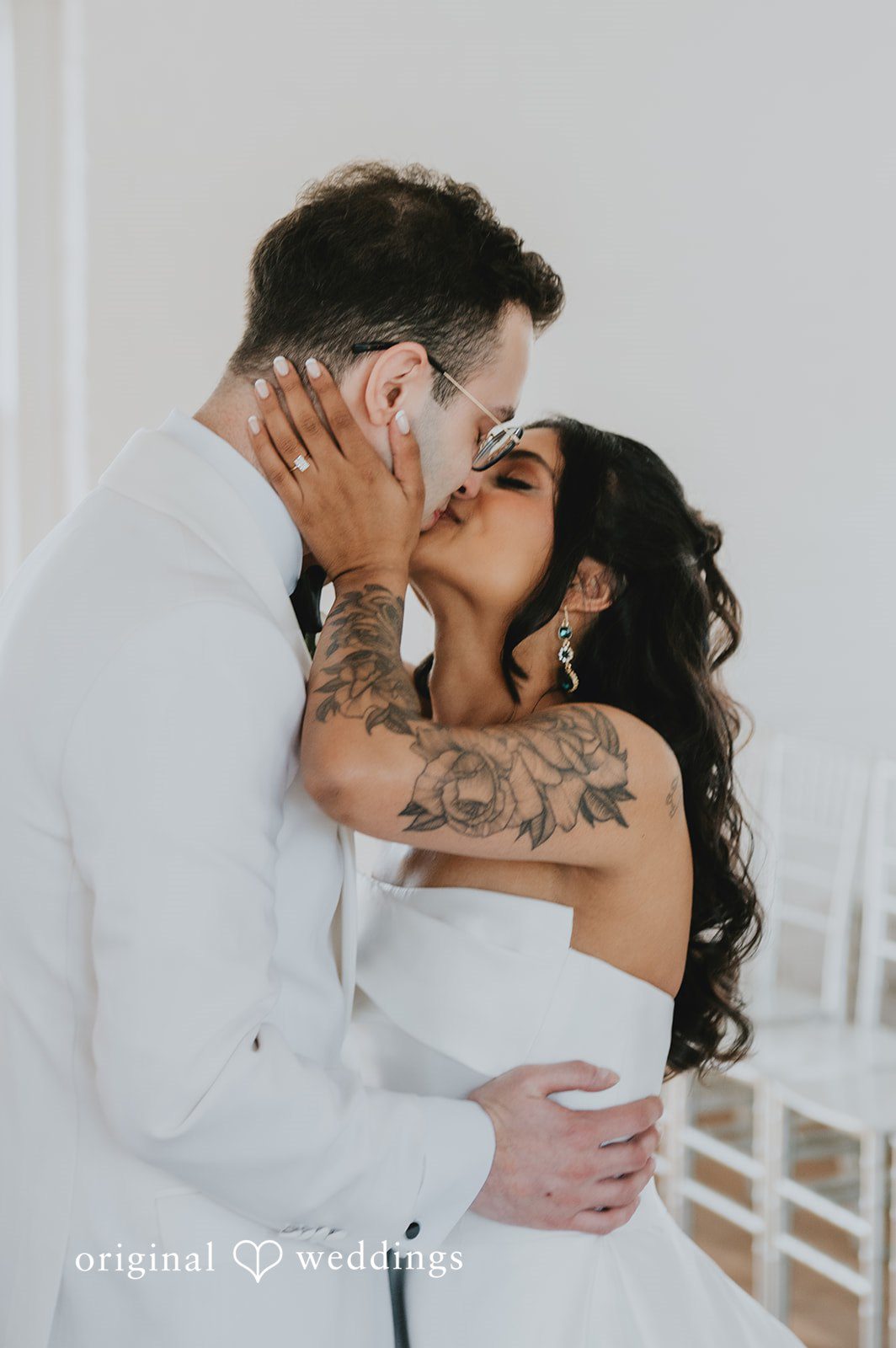 The couple shares a kiss