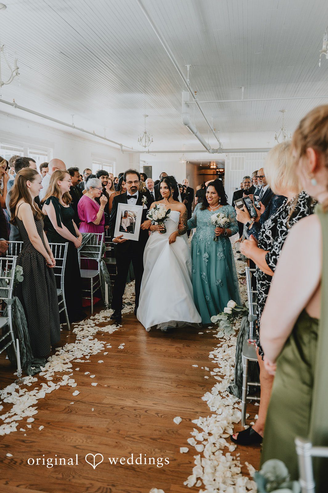 Our DC wedding photographers captured the moment the bride's parents walked the bride down the aisle