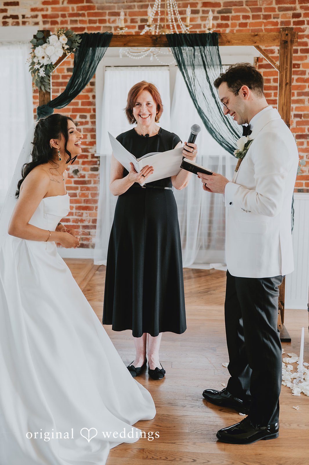 The groom reads his vows