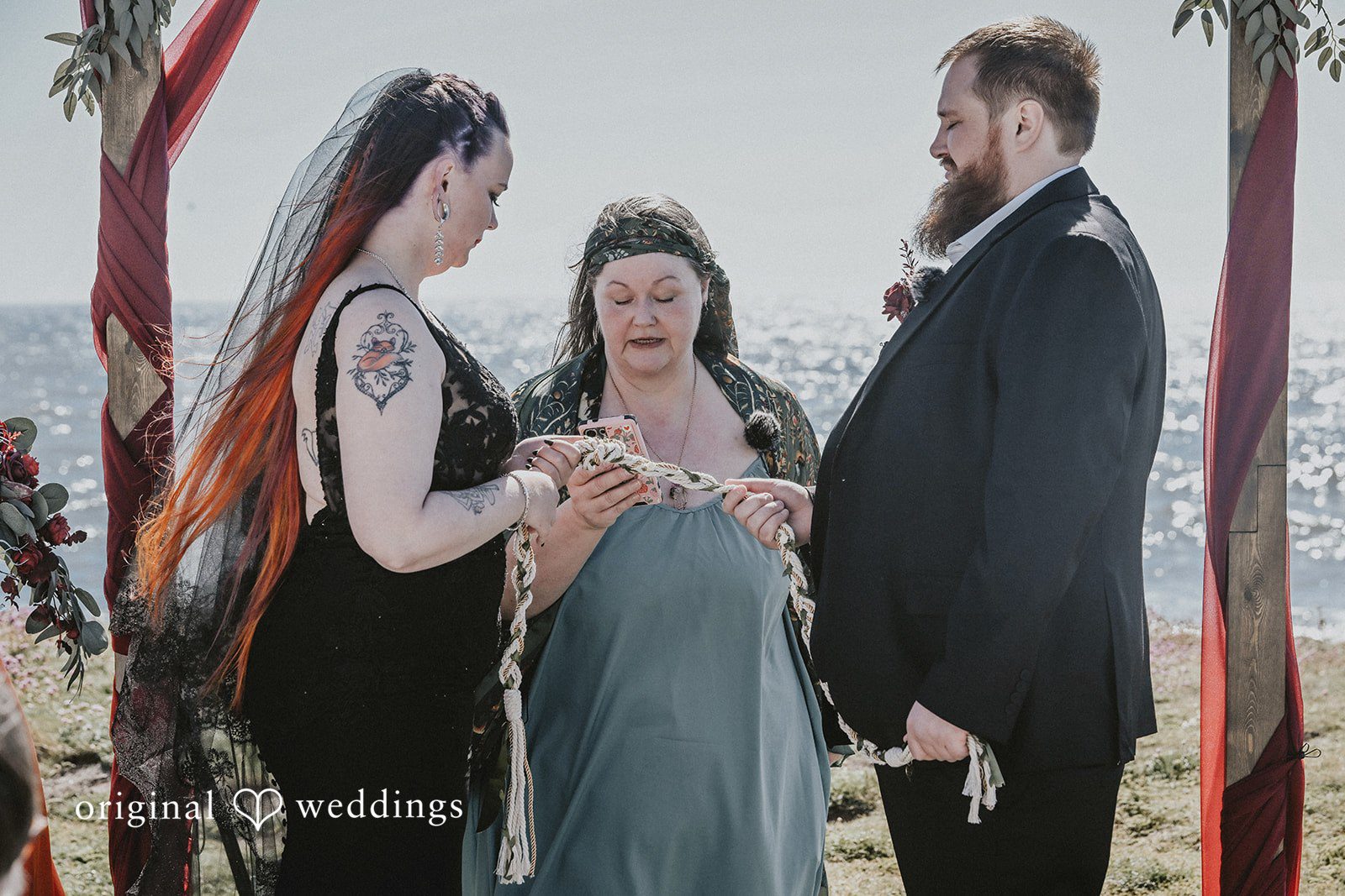 Close-up of a bride and groom exchanging vows at the altar.