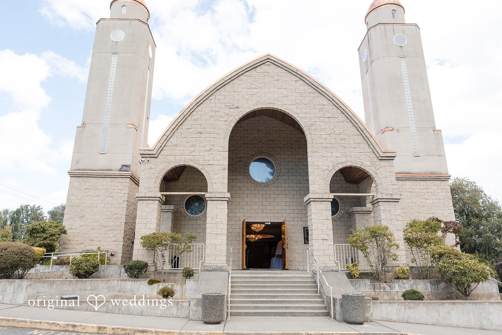 Exterior shot of a large gothic-style church with tall spires.