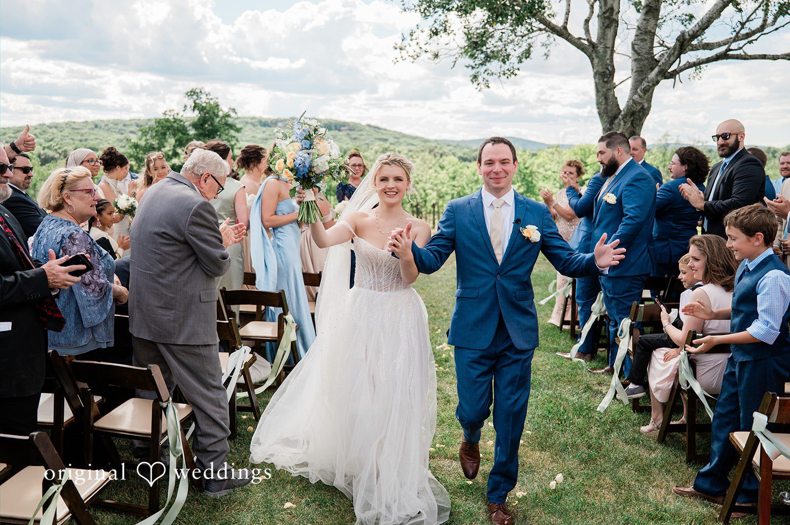 Our Hartford CT wedding photographers captured the moment the couple made a joyful exit after their wedding ceremony