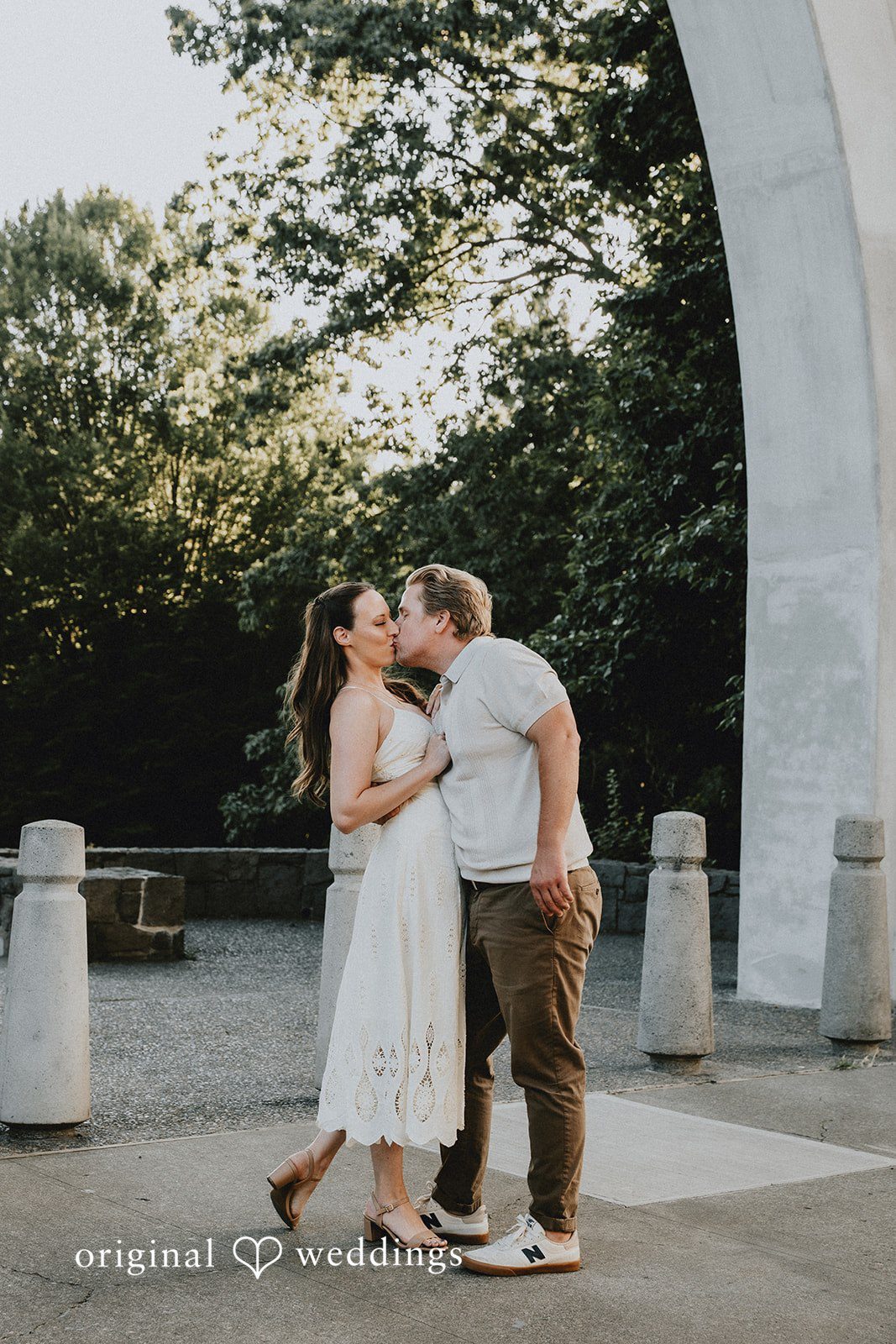 Meghan + Jonny The couple shares a romantic kiss