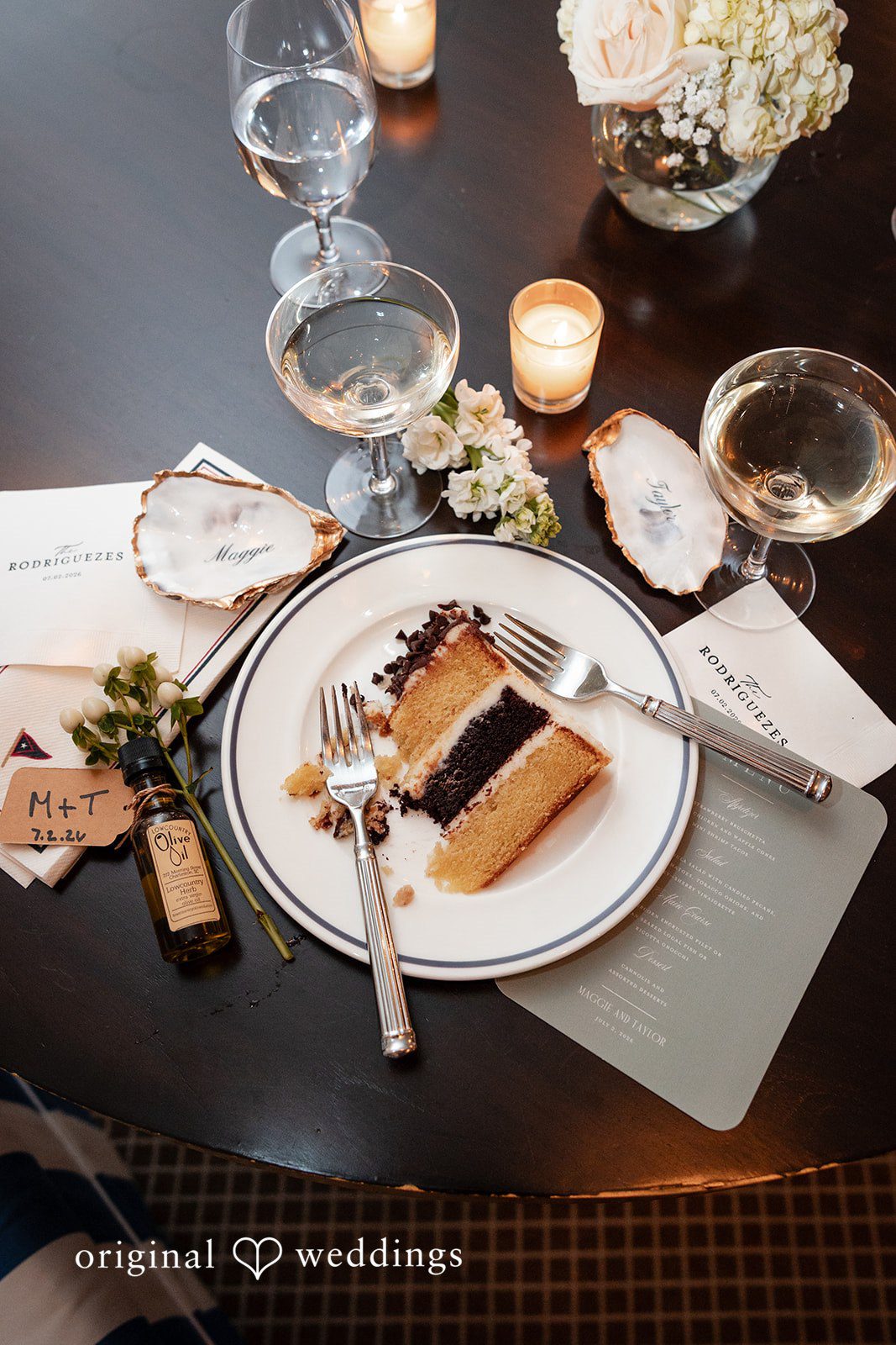Maggie + Taylor A beautifully styled wedding reception place setting with a personalized menu.