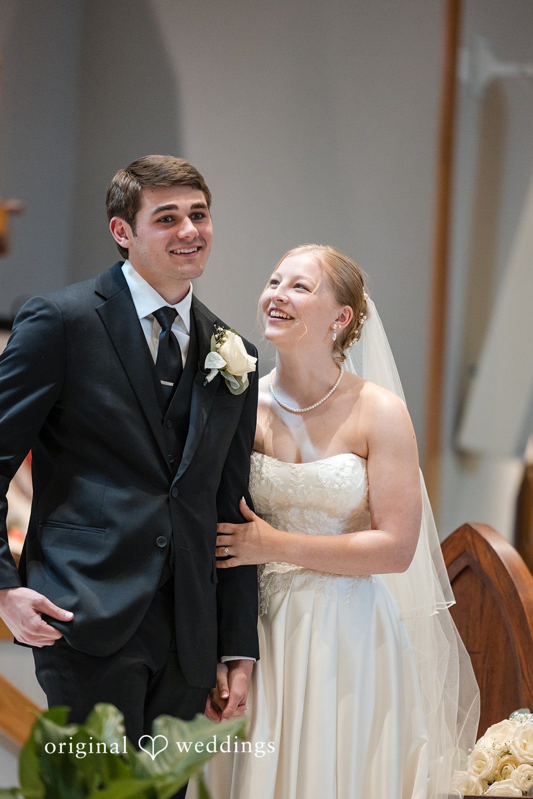 Cora + Michael Elegant bride and groom smiling moment at the Emerald Event Center