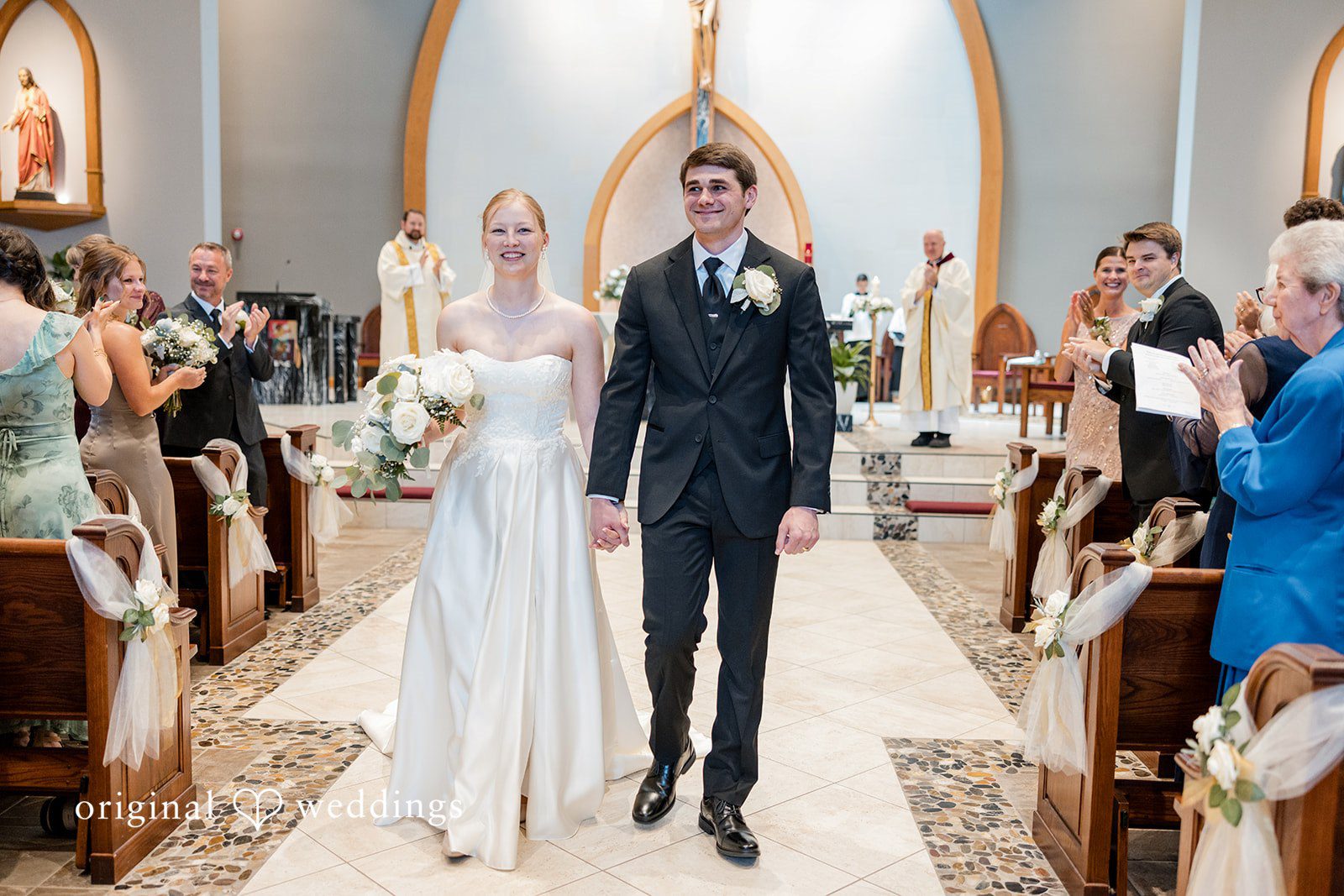 Cora + Michael Elegant bride and groom walking outside at the Emerald Event Center