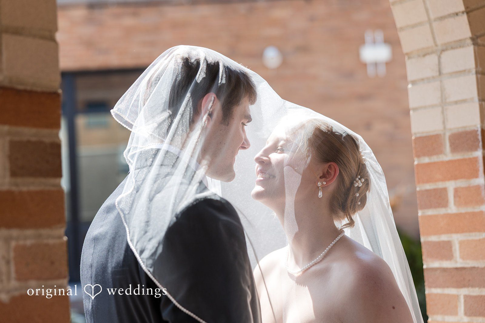 Cora + Michael Elegant bride and groom close-up photography at the Emerald Event Center