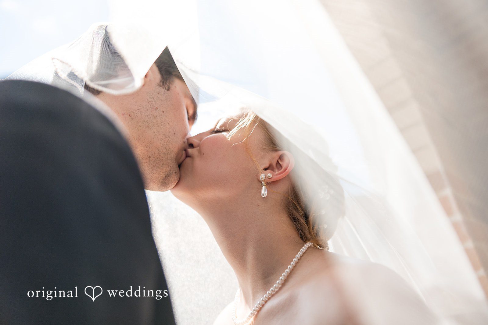 Cora + Michael Beautiful emotional kiss moment at the Emerald Event Center