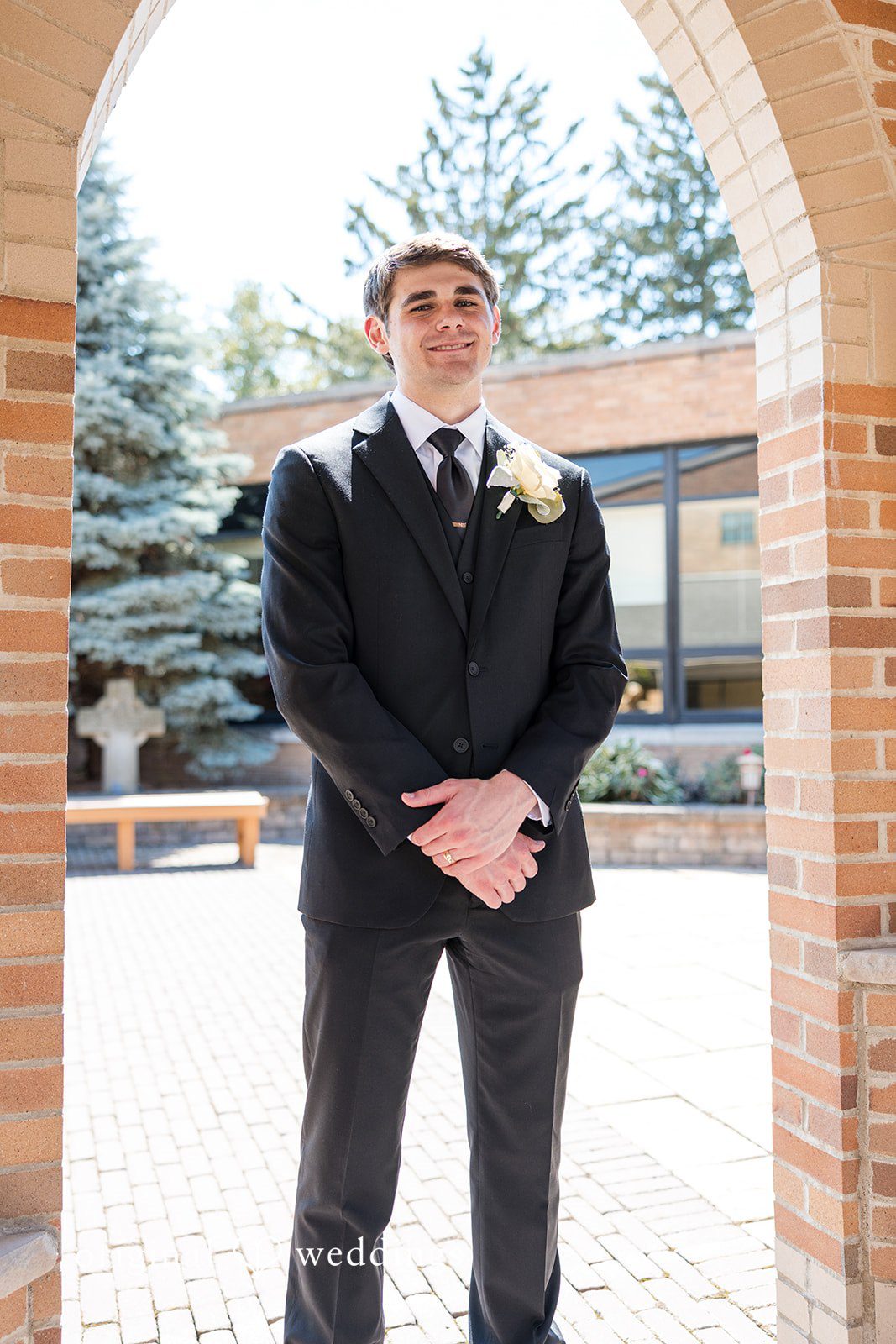 Cora + Michael Classic groom wedding portrait at the Emerald Event Center