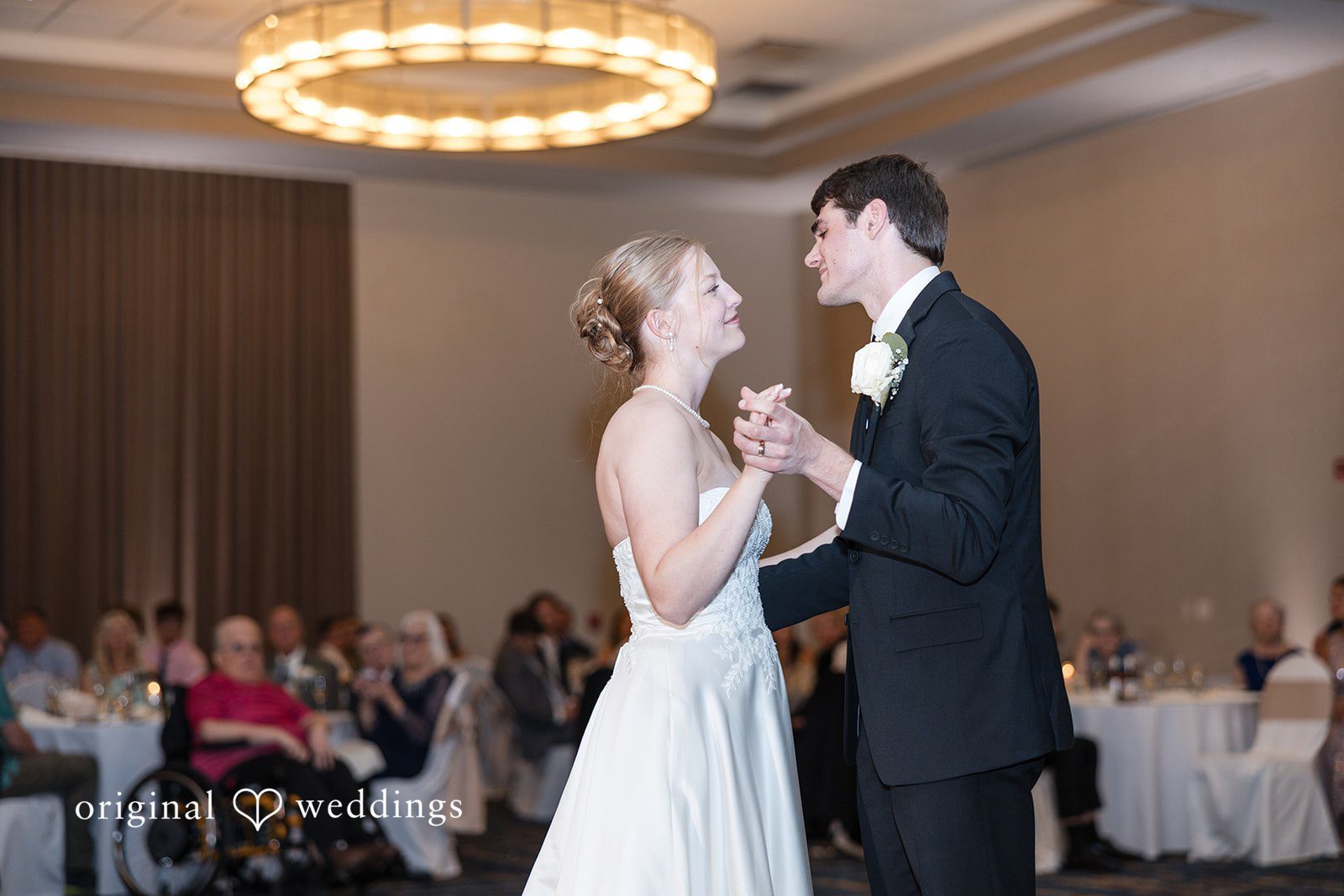 Cora + Michael Elegant bride and groom reception dance moment at the Emerald Event Center