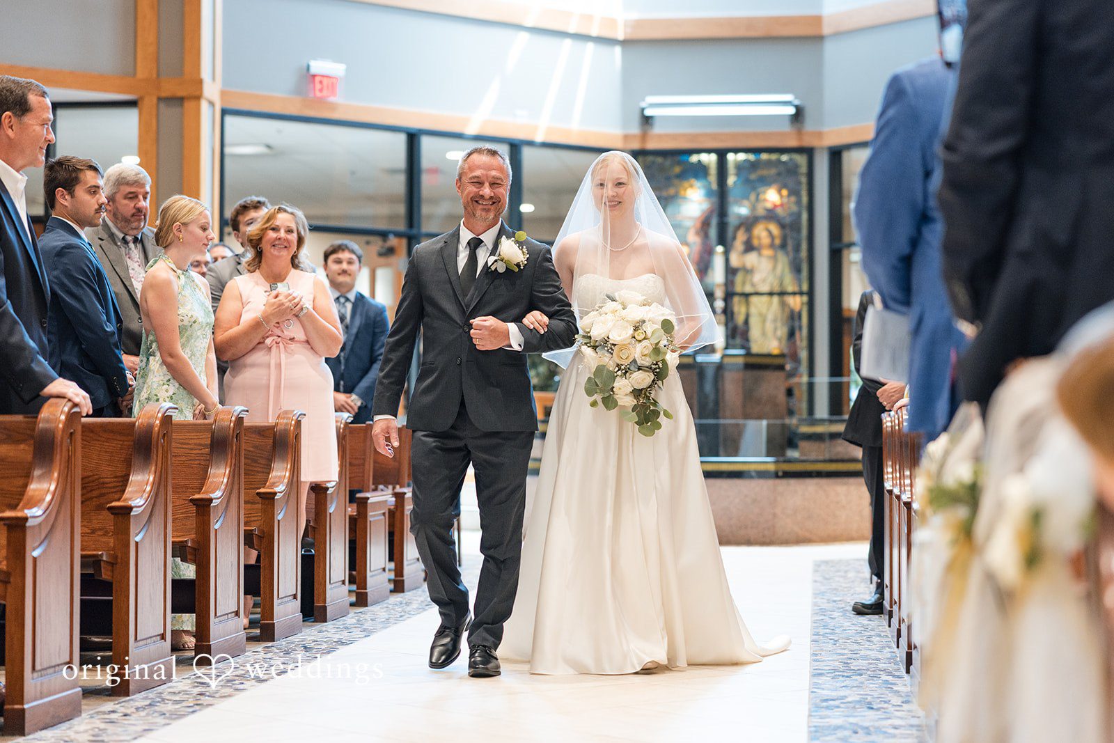 Cora + Michael Beautiful bridal entry photography at the Emerald Event Center