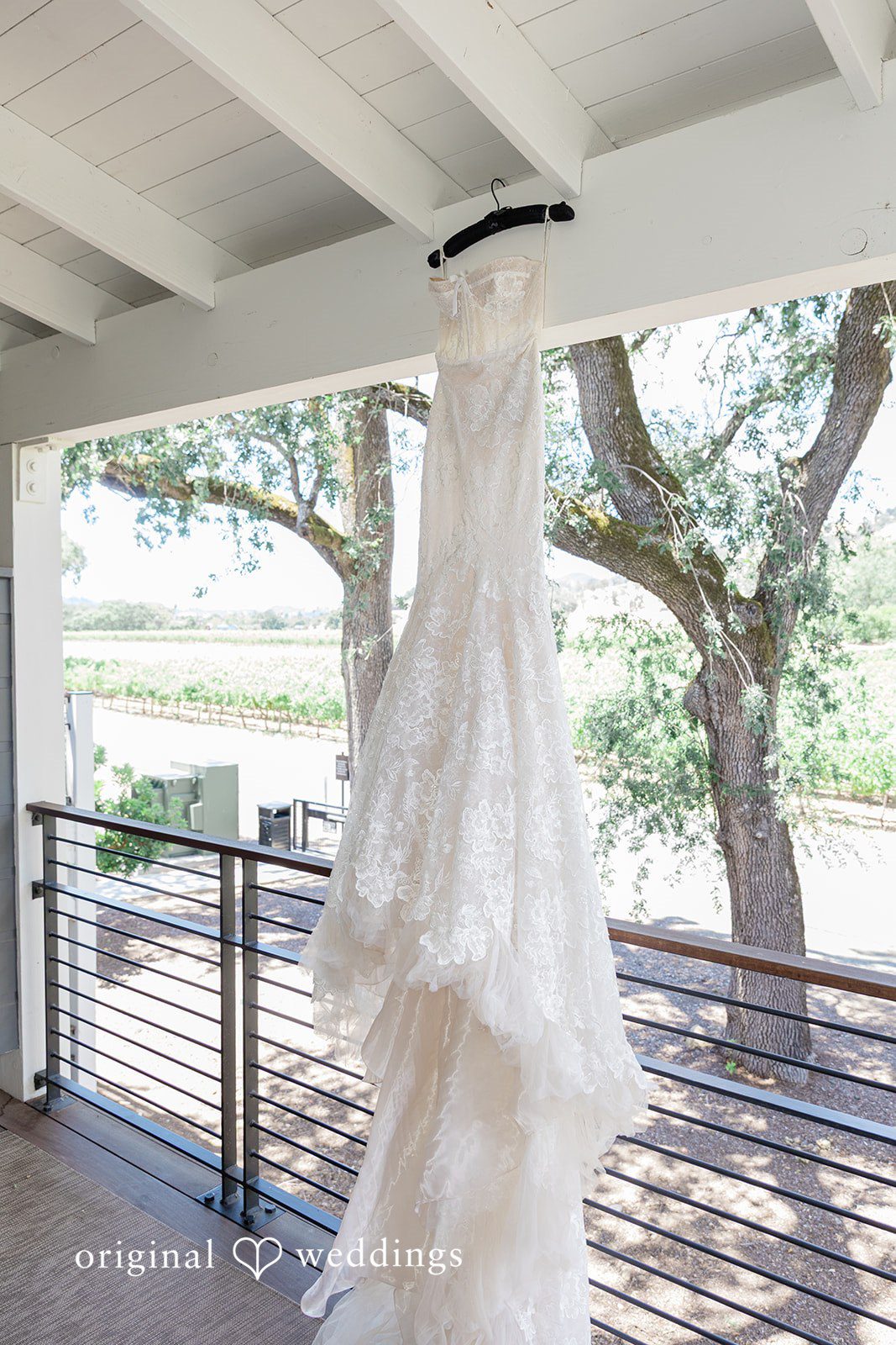 Mehul + Nazanin The bride's wedding gown gracefully hanging out