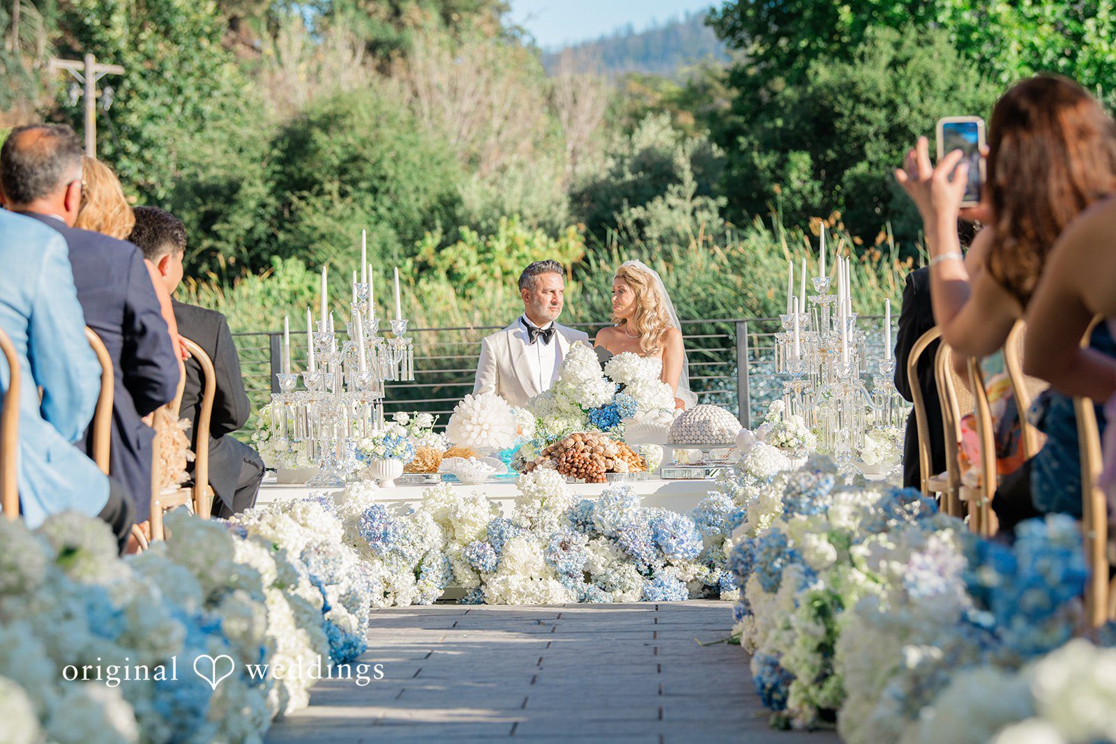 Mehul + Nazanin Beautiful portrait of the couple in their wedding ceremony space
