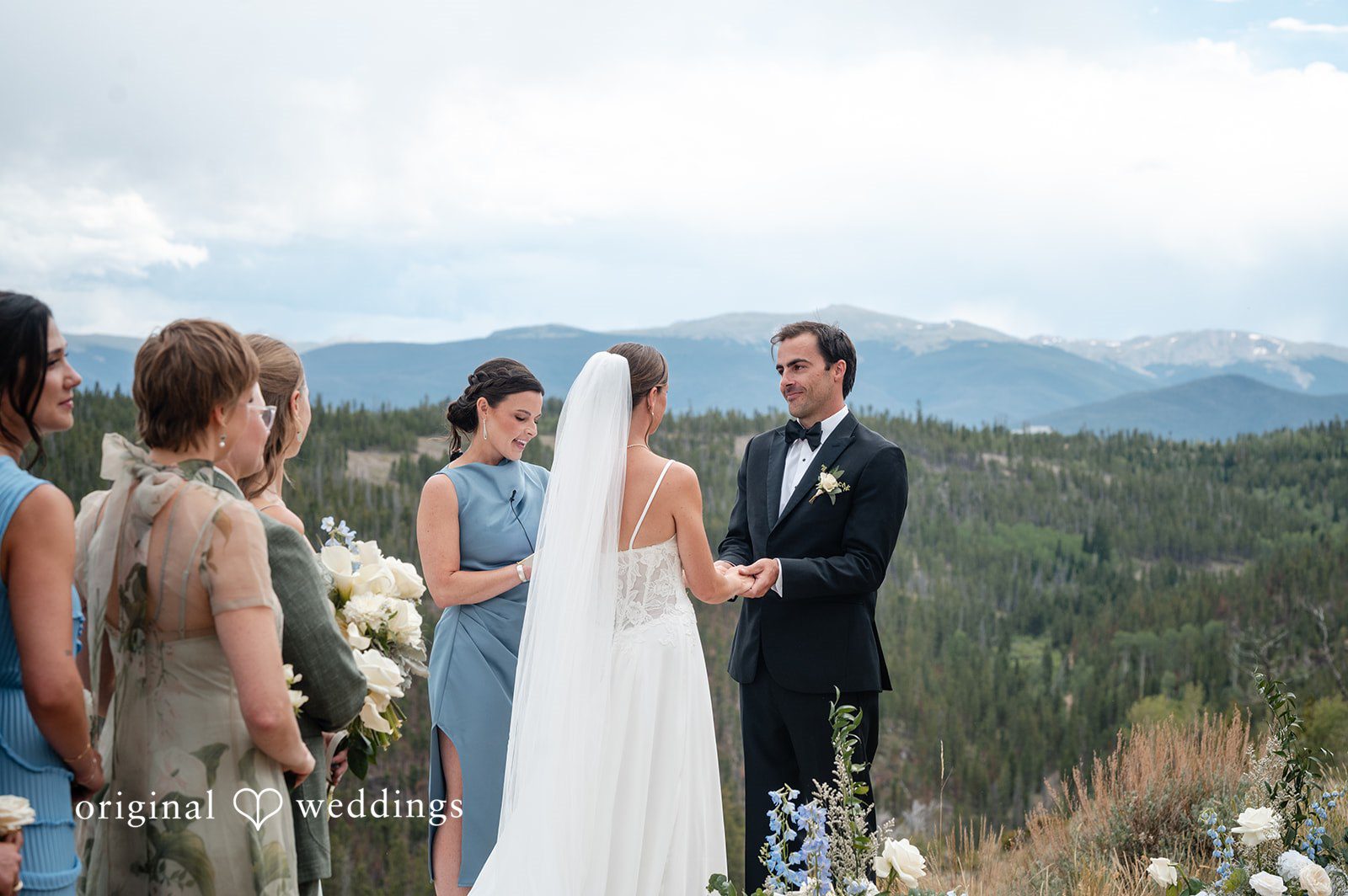 Emilia + Charlie A bride and groom standing together during their wedding ceremony.