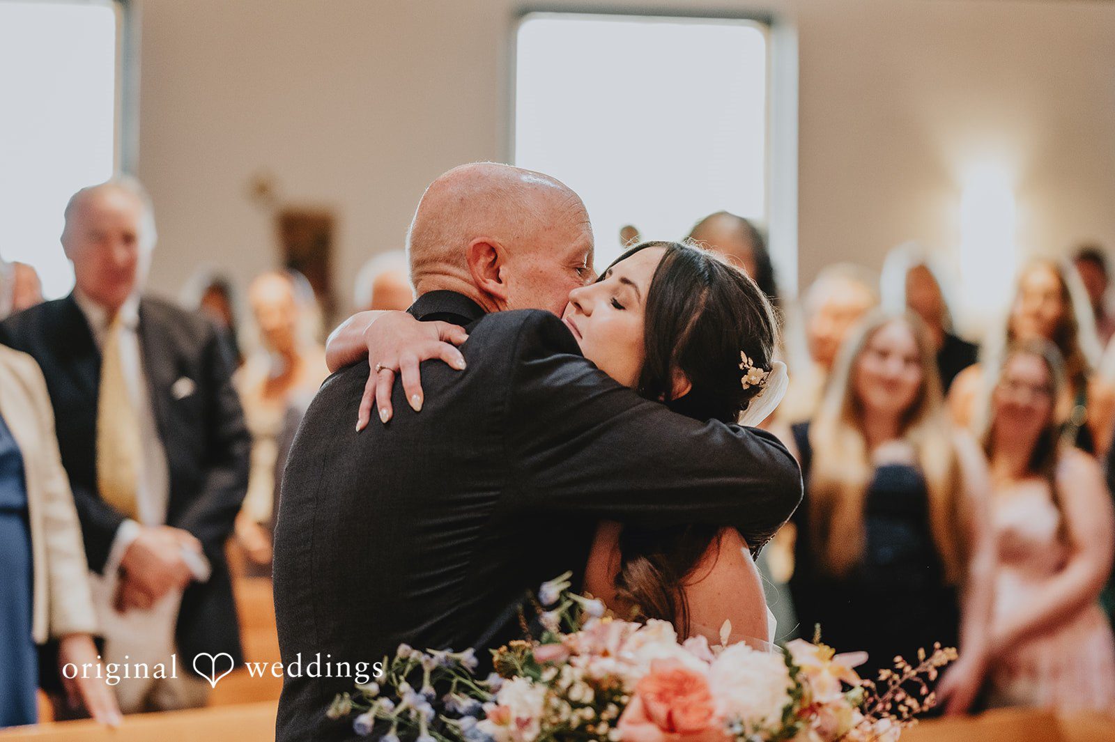 Emotional groom wiping away a tear at the altar at Highlands Ranch Mansion.