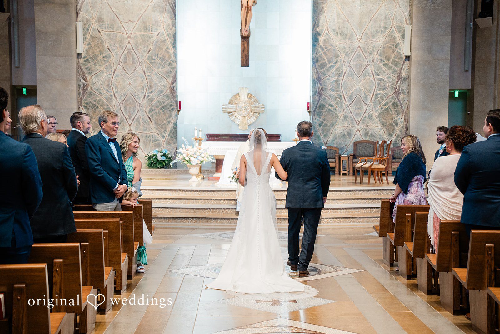 Andrew + Lyndsey The bride walks down the aisle