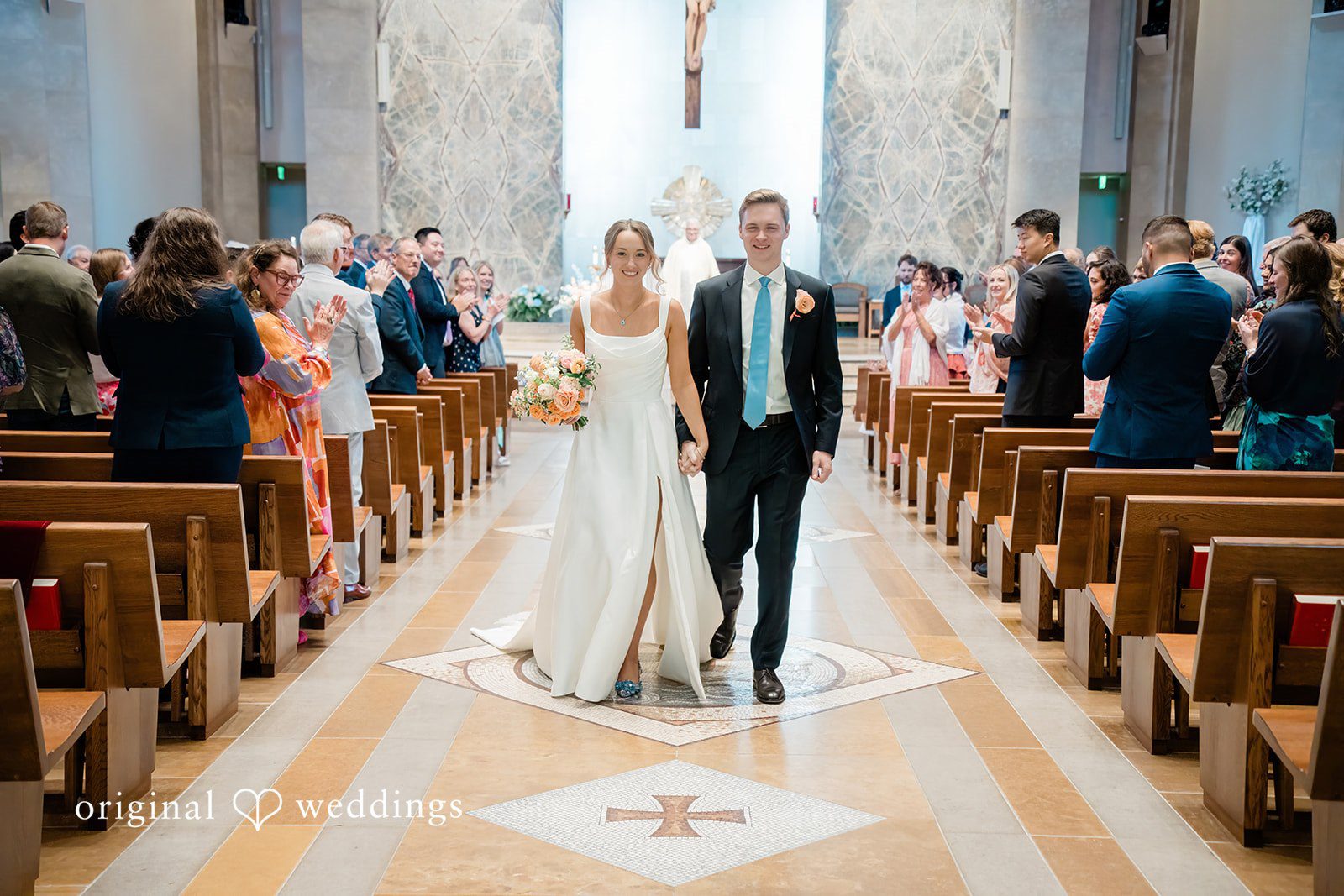 Andrew + Lyndsey Our Austin wedding photographers captured the moment the couple made their exit after the wedding ceremony