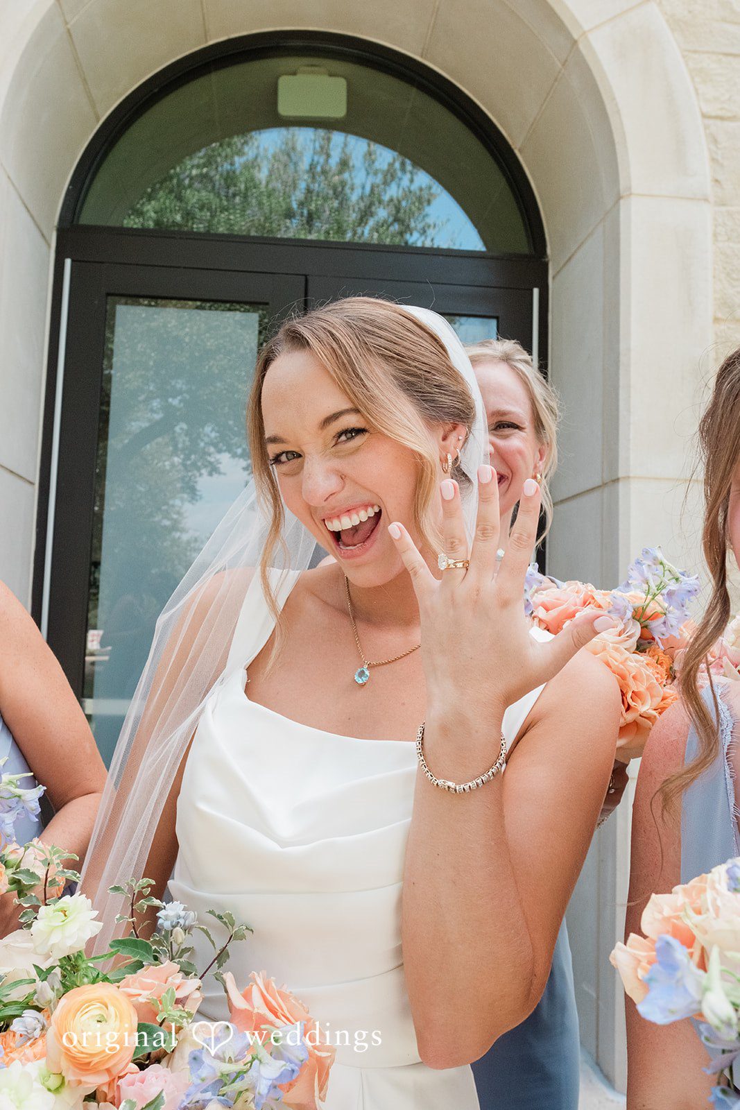 Andrew + Lyndsey The bride shows off her wedding ring