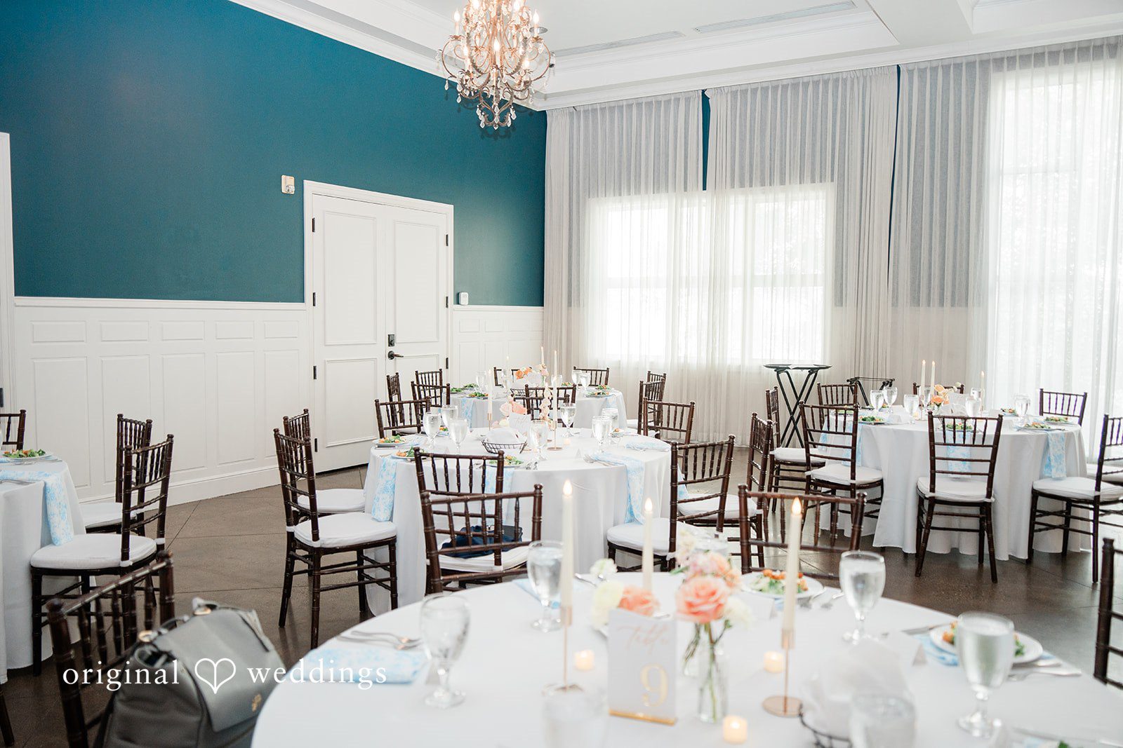 Andrew + Lyndsey Decorated tables at the wedding reception hall