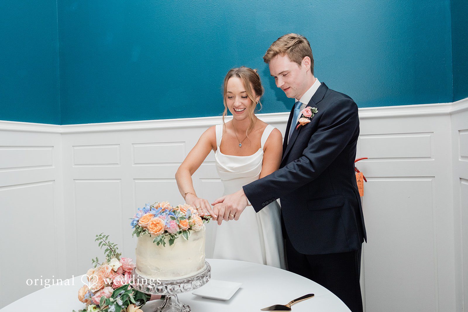 Andrew + Lyndsey The couple cuts their wedding cake