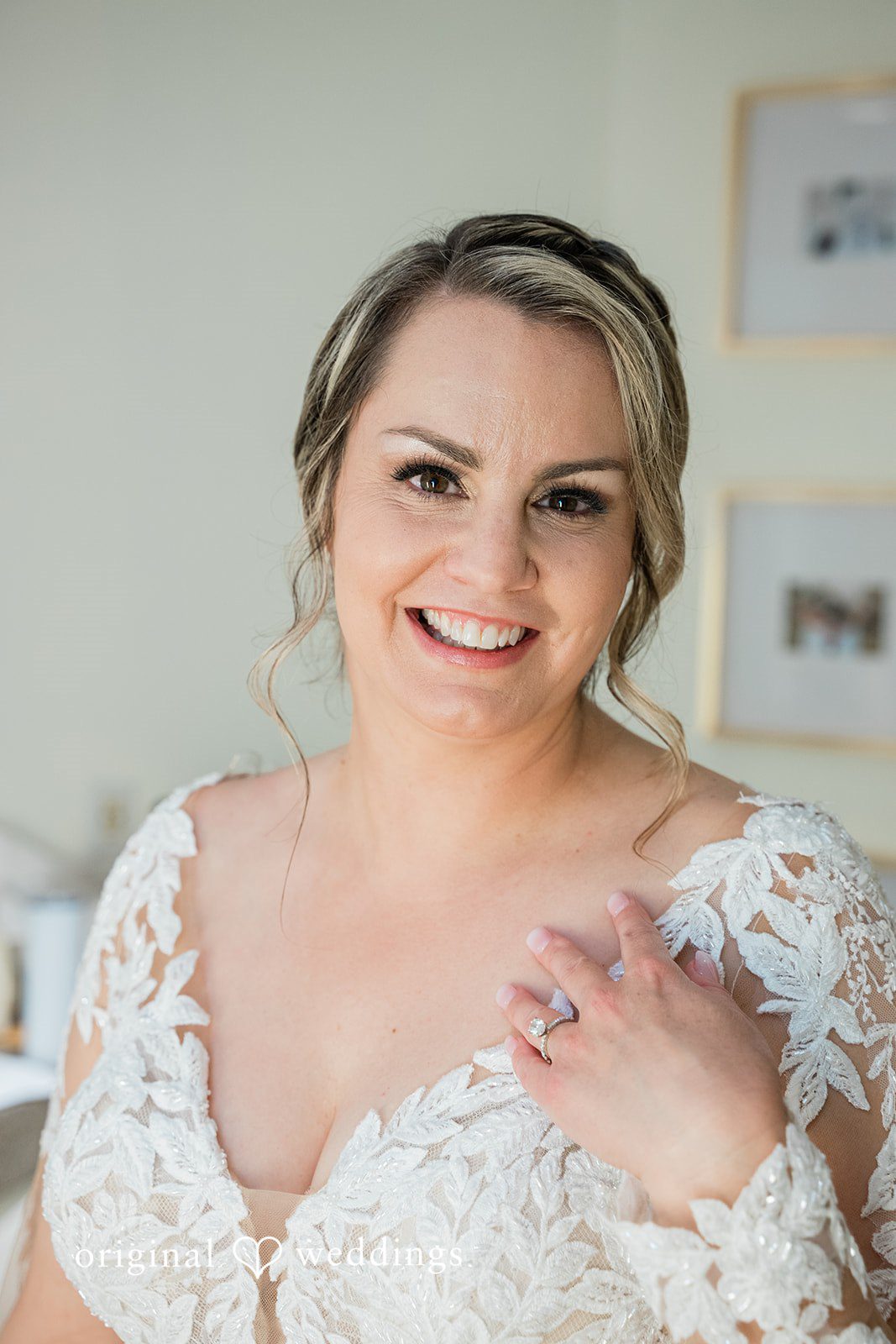 Jessica + Patrick A close-up portrait of a smiling bride wearing a lace wedding dress.