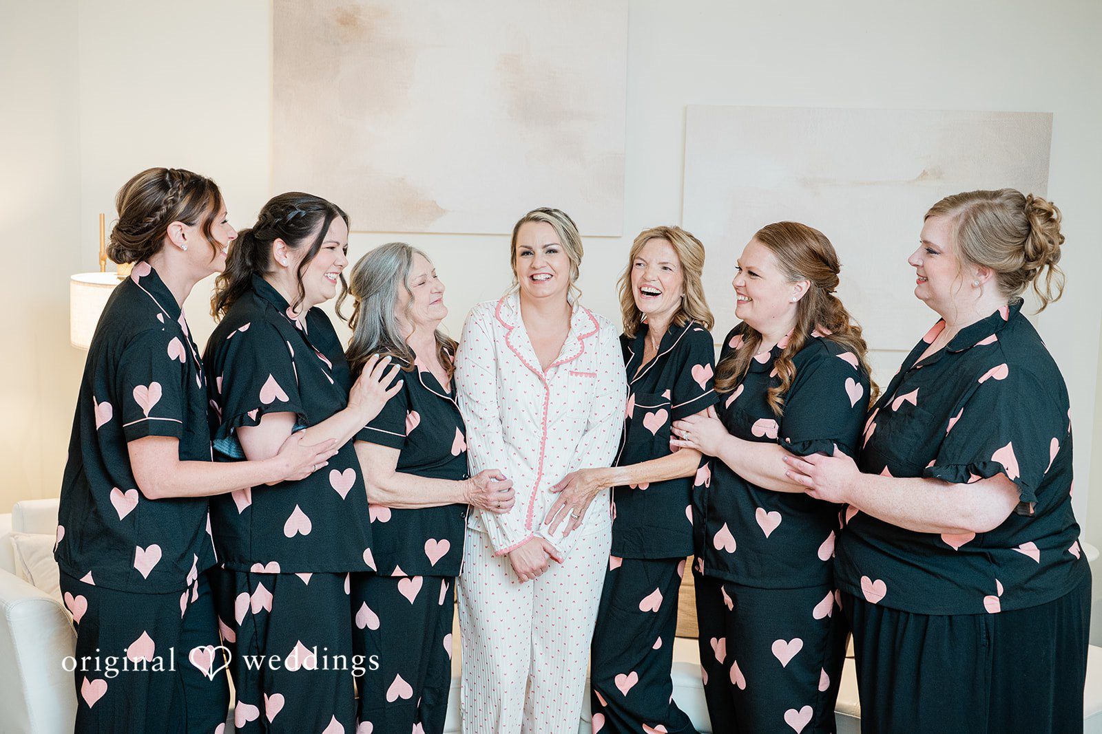Jessica + Patrick Bride and bridesmaid are standing together at Miraval Gardens.