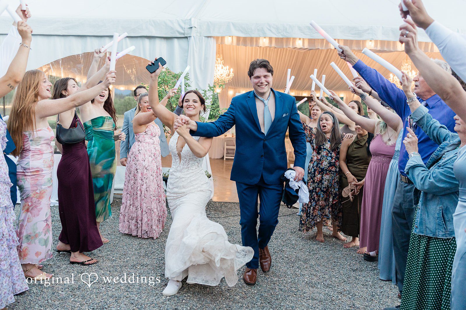 Jaelynn + Jayden The couple makes a joyful exit after their wedding reception