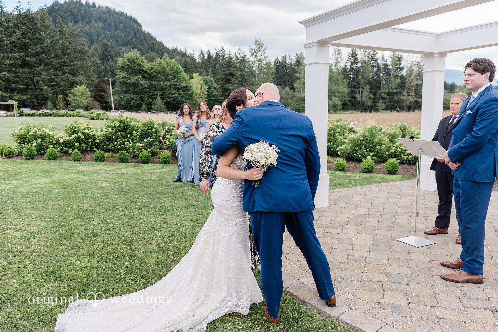 Jaelynn + Jayden The bride shares a hug with her dad