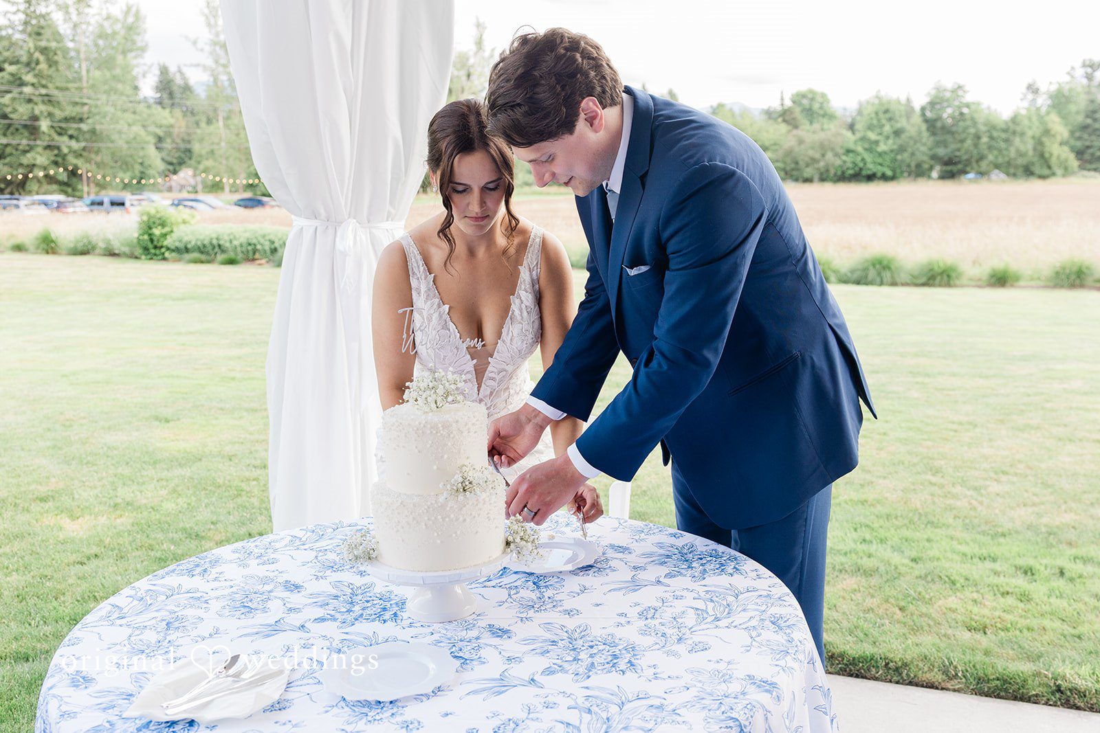 Jaelynn + Jayden The couple cuts their wedding cake