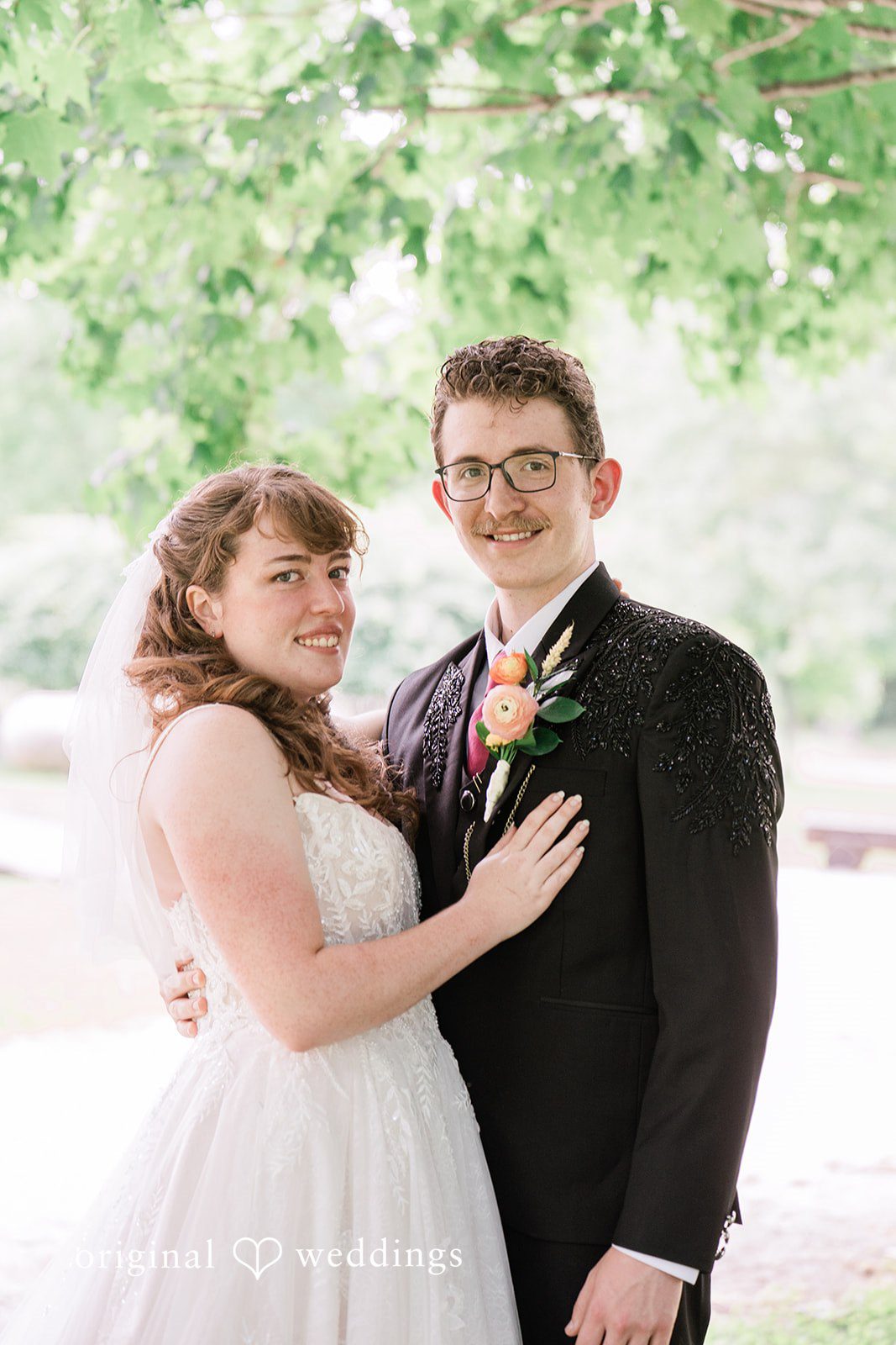 Lovely picture of bride and groom in a backyard
