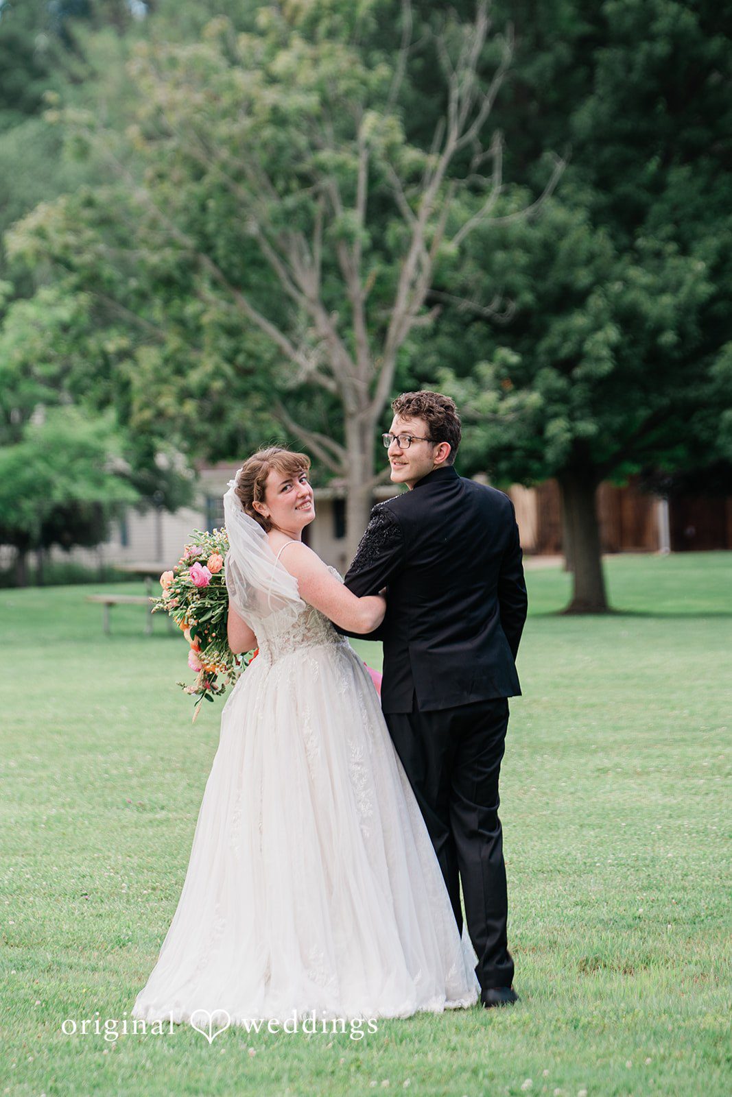 Stunning picture of bride and groom in a backyard