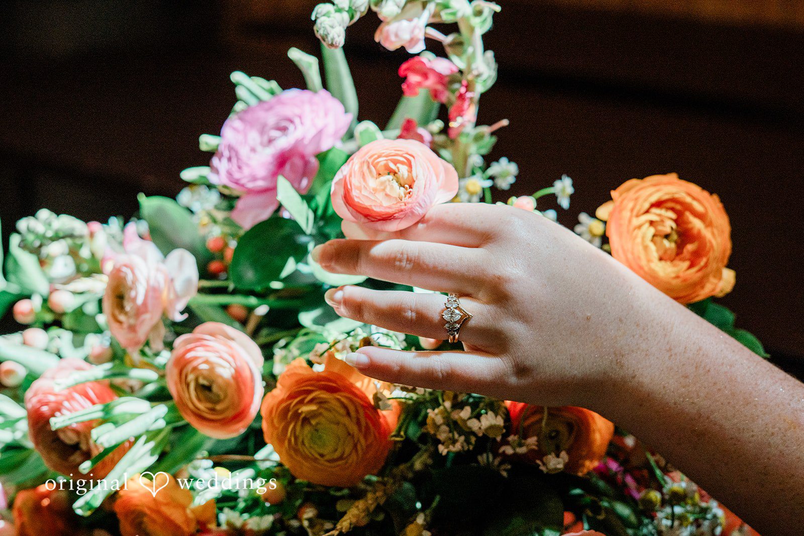 Lovely picture of bride's hand with a ring on it
