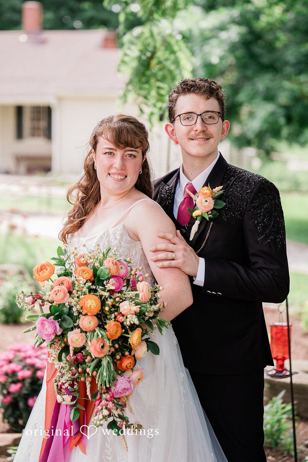 Stunning picture of couple in a backyard captured by Original Weddings