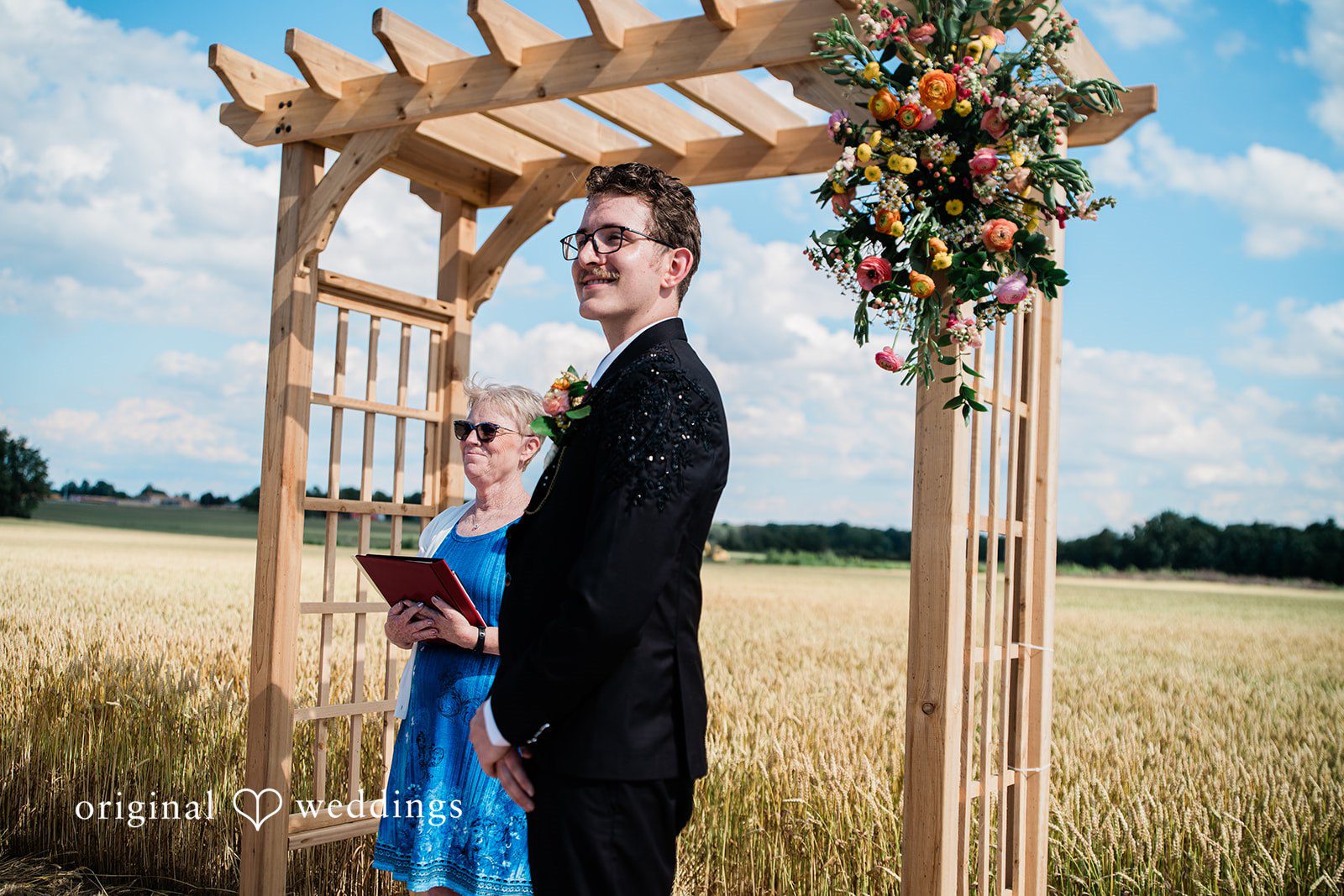 Groom waiting and looking for the bride at wedding ceremony