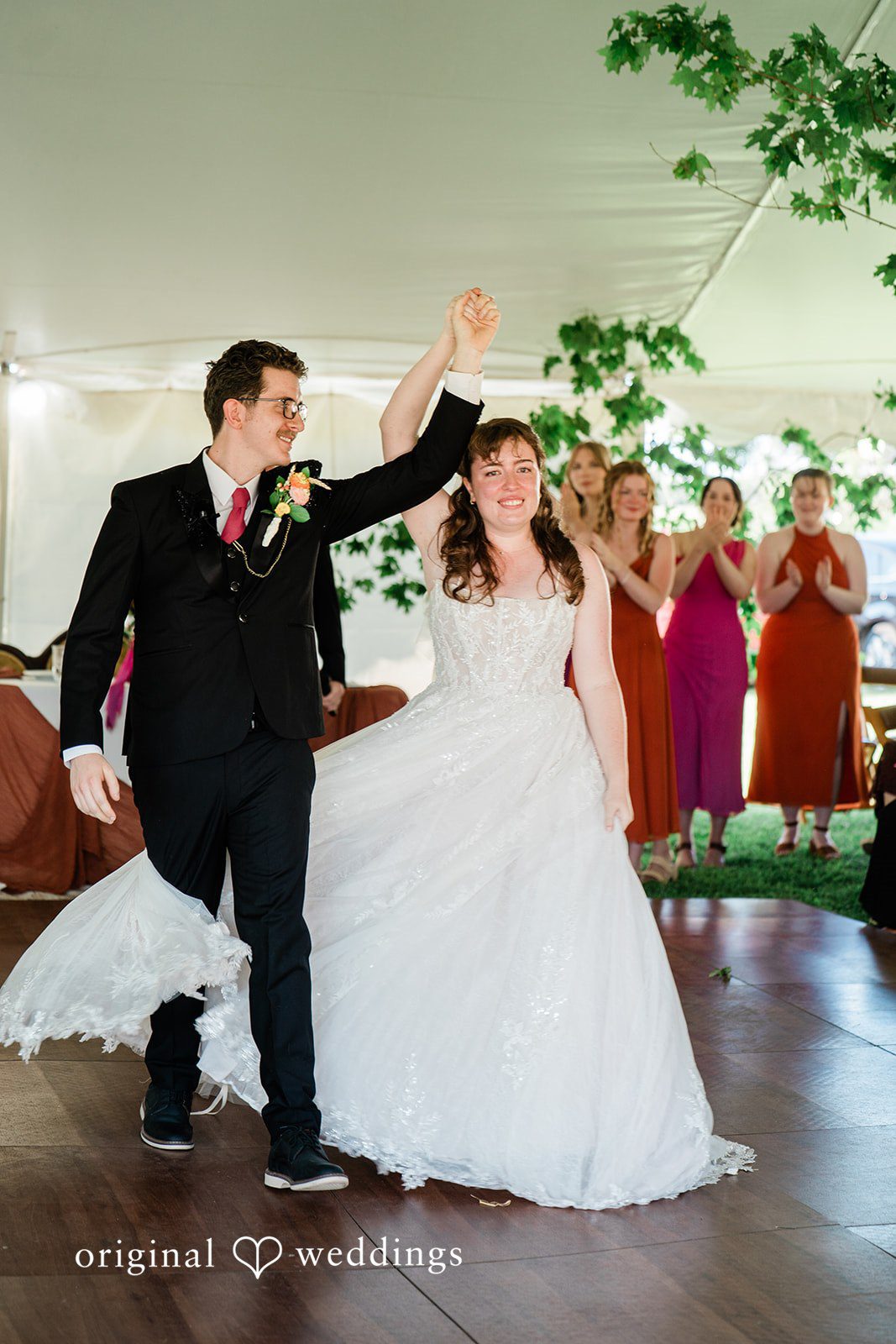 Bride and groom sharing a romantic dance in wedding reception