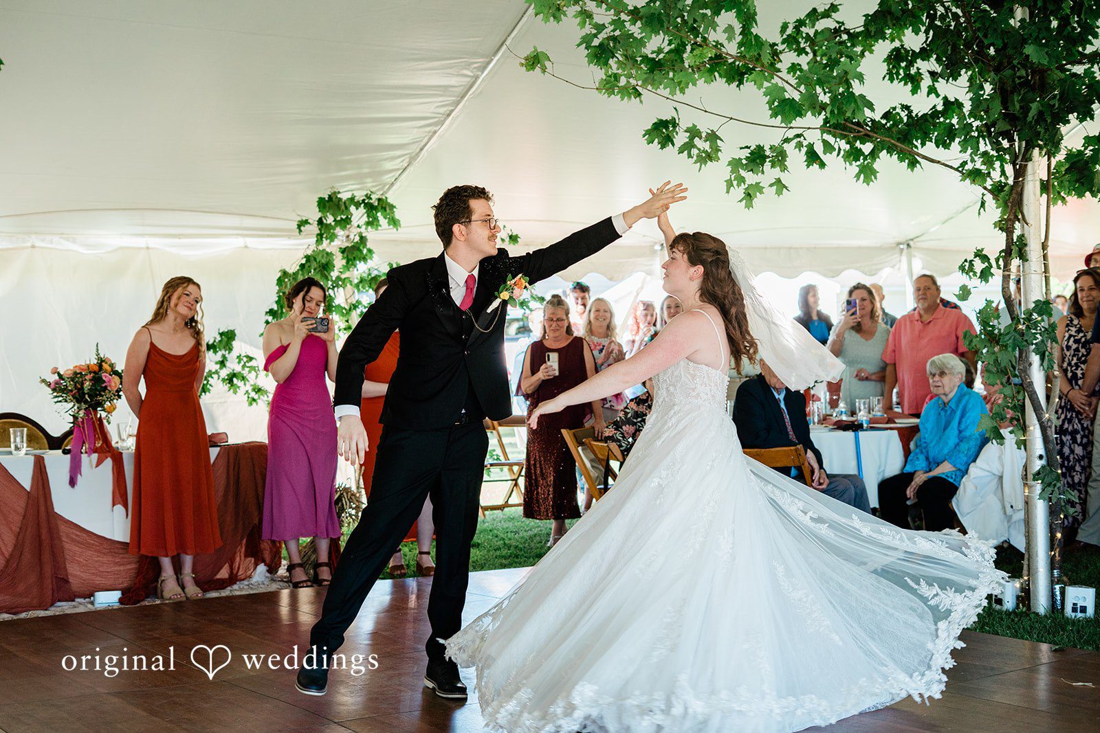 Bride and groom sharing a romantic dance in wedding reception