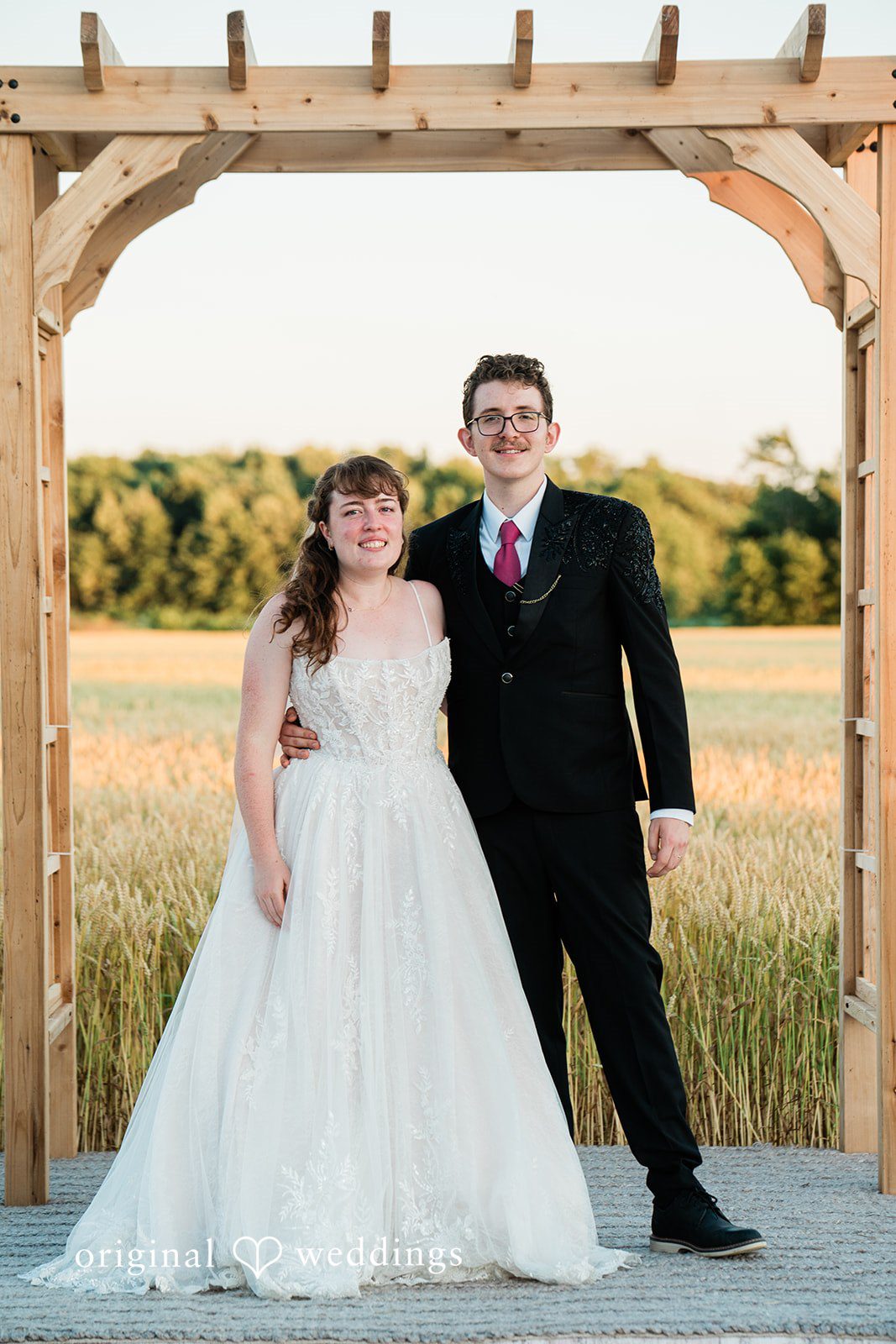 Lovely picture of bride and groom posing for wedding photography