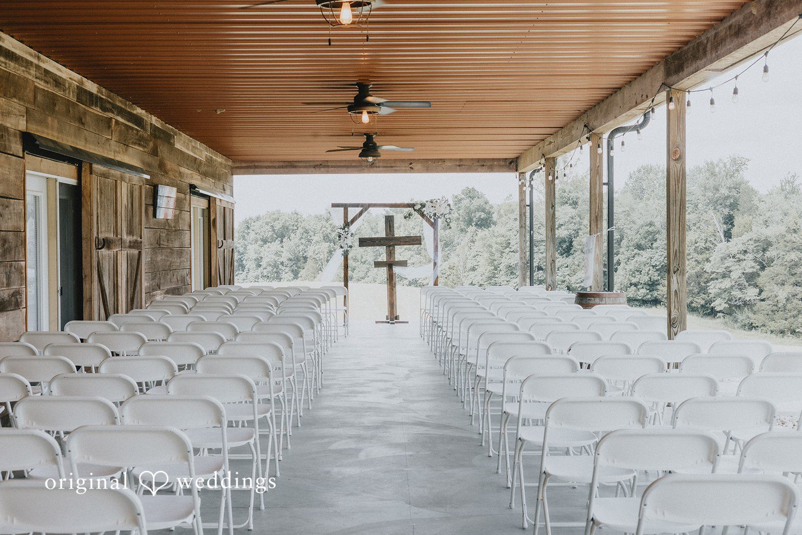 Abby + Tyler Neatly arranged chairs for the wedding ceremony