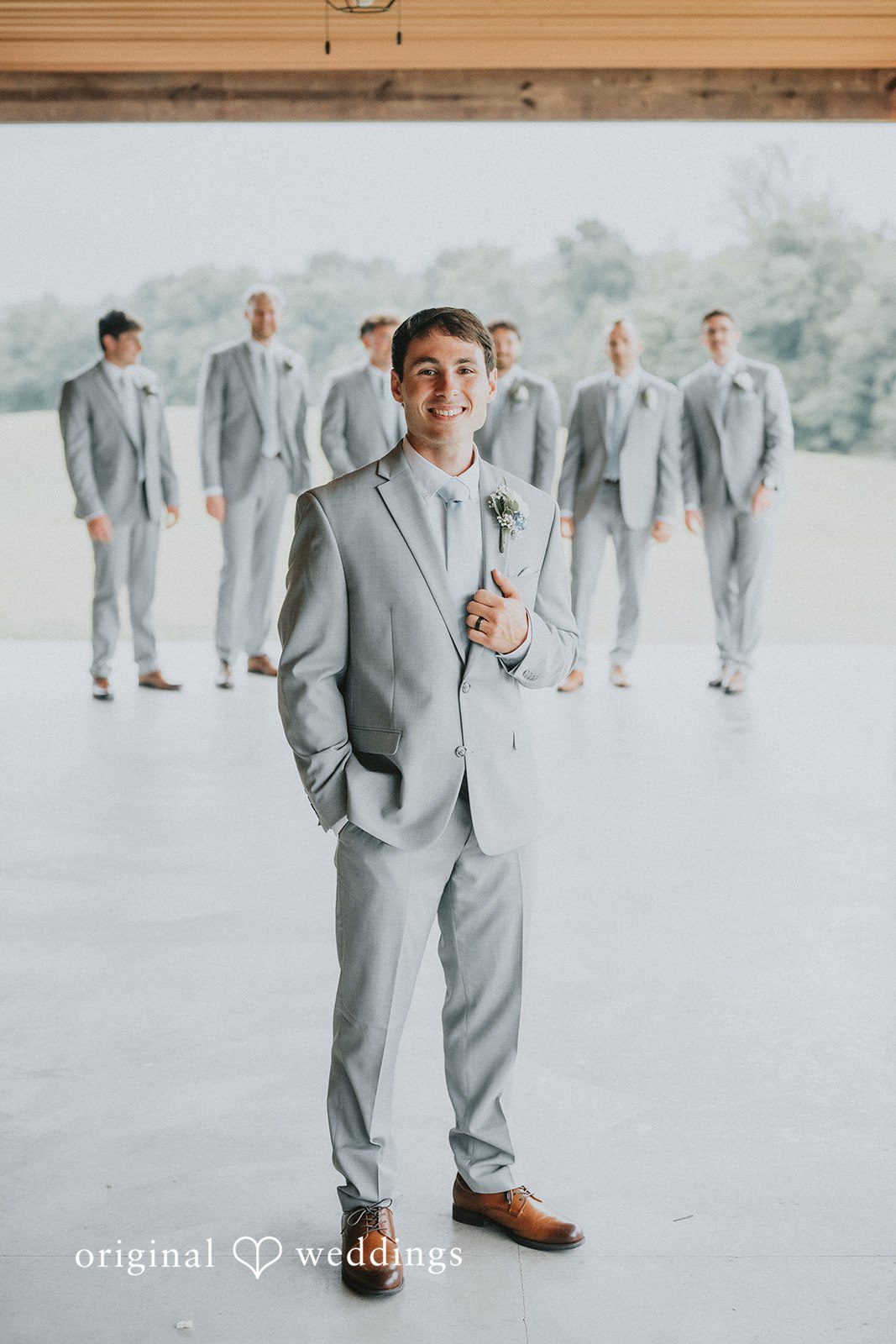 Abby + Tyler A stylish portrait of the groom and his groomsmen