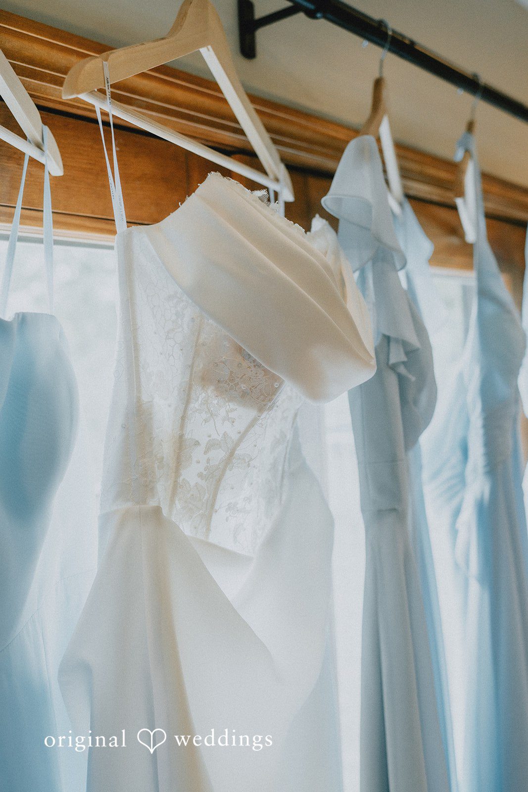 Abby + Tyler The bride's gown and the bridesmaids' gowns hang beautifully