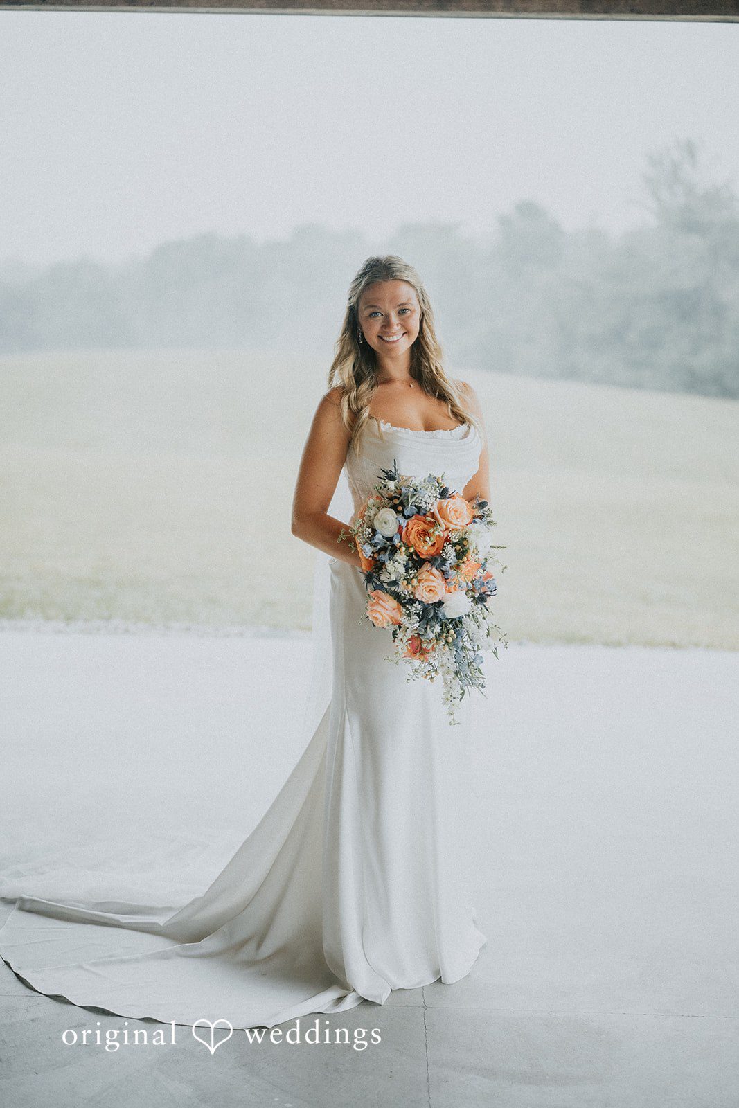 Abby + Tyler A stunning portrait of the bride in the outdoors