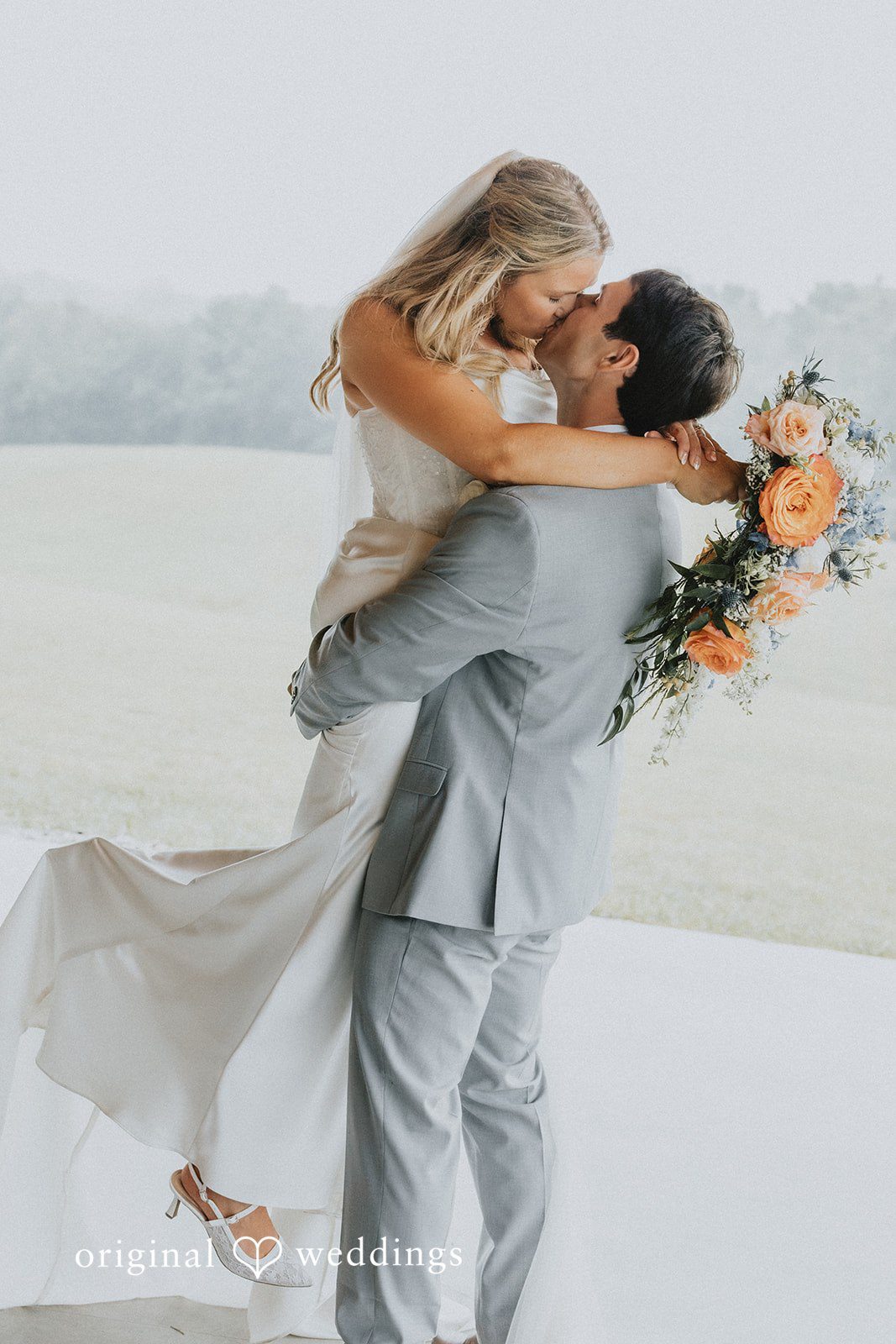 Abby + Tyler The couple shares a kiss