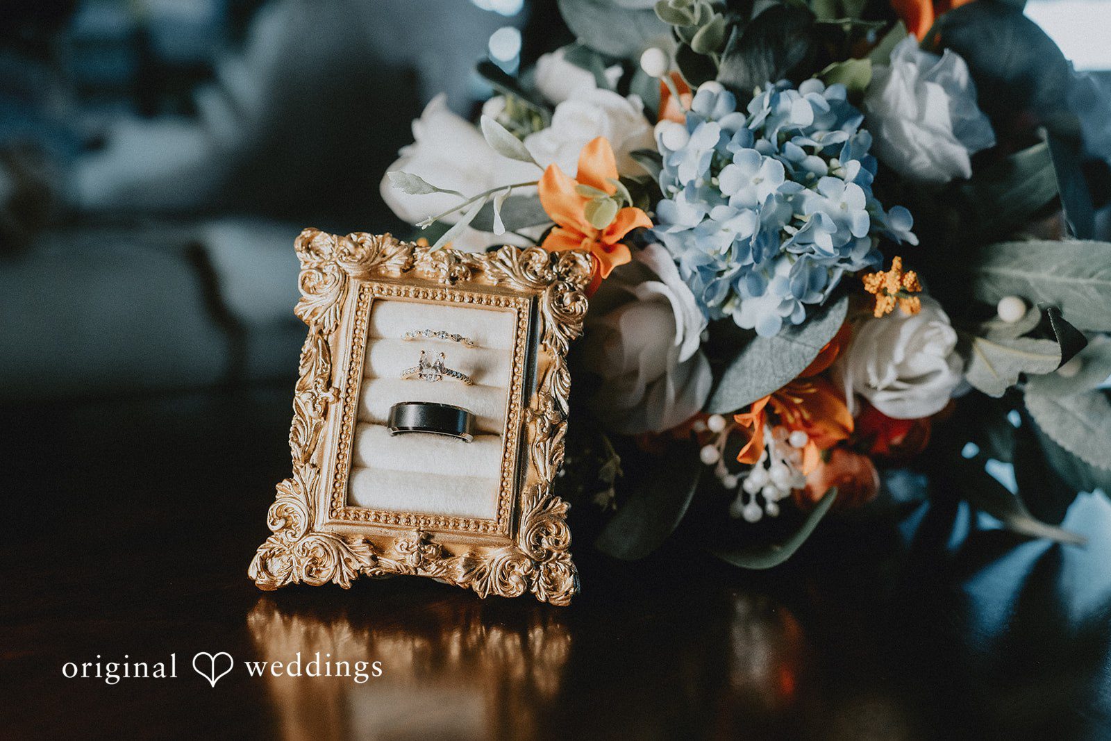 Abby + Tyler A stunning detail shot of the ring and bouquet